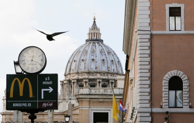 A McDonald's sign is seen at Via della Conciliazione in Rome, in front of Vatican City's St. Peter's Square