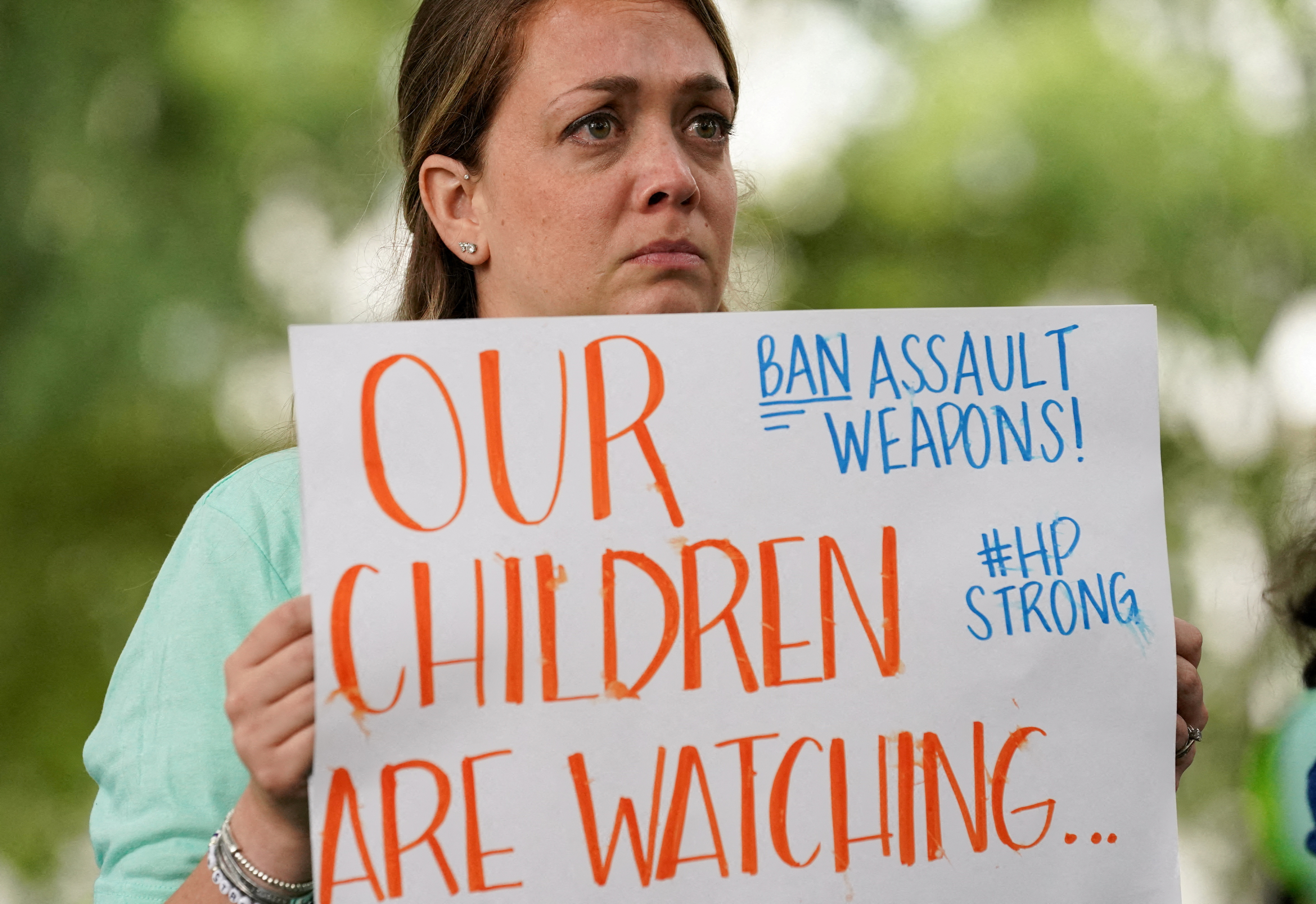 Activists hold a rally calling for a ban on assault weapons, at the U.S. Capitol in Washington