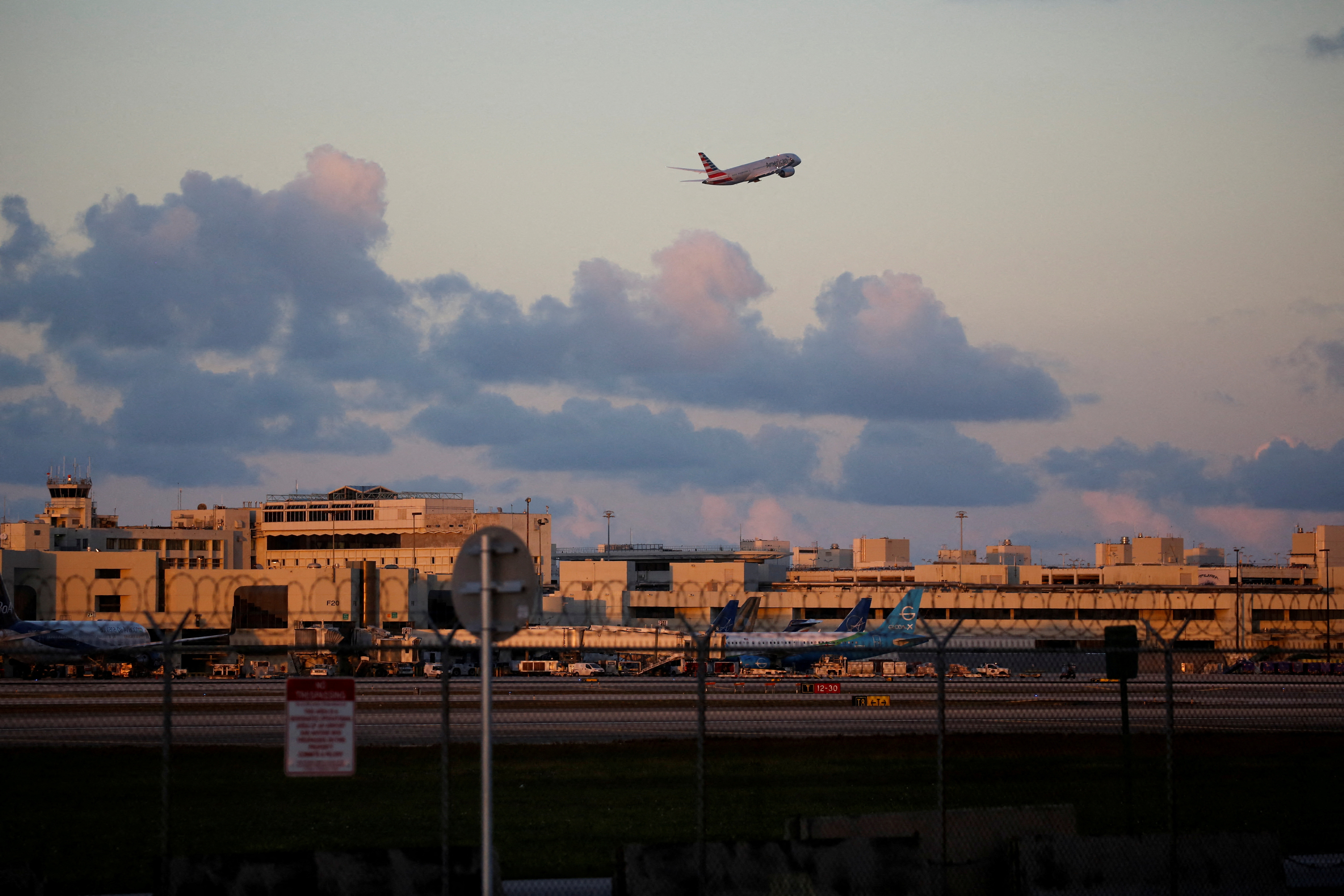 An American Airlines plane takes off from Miami International Airport