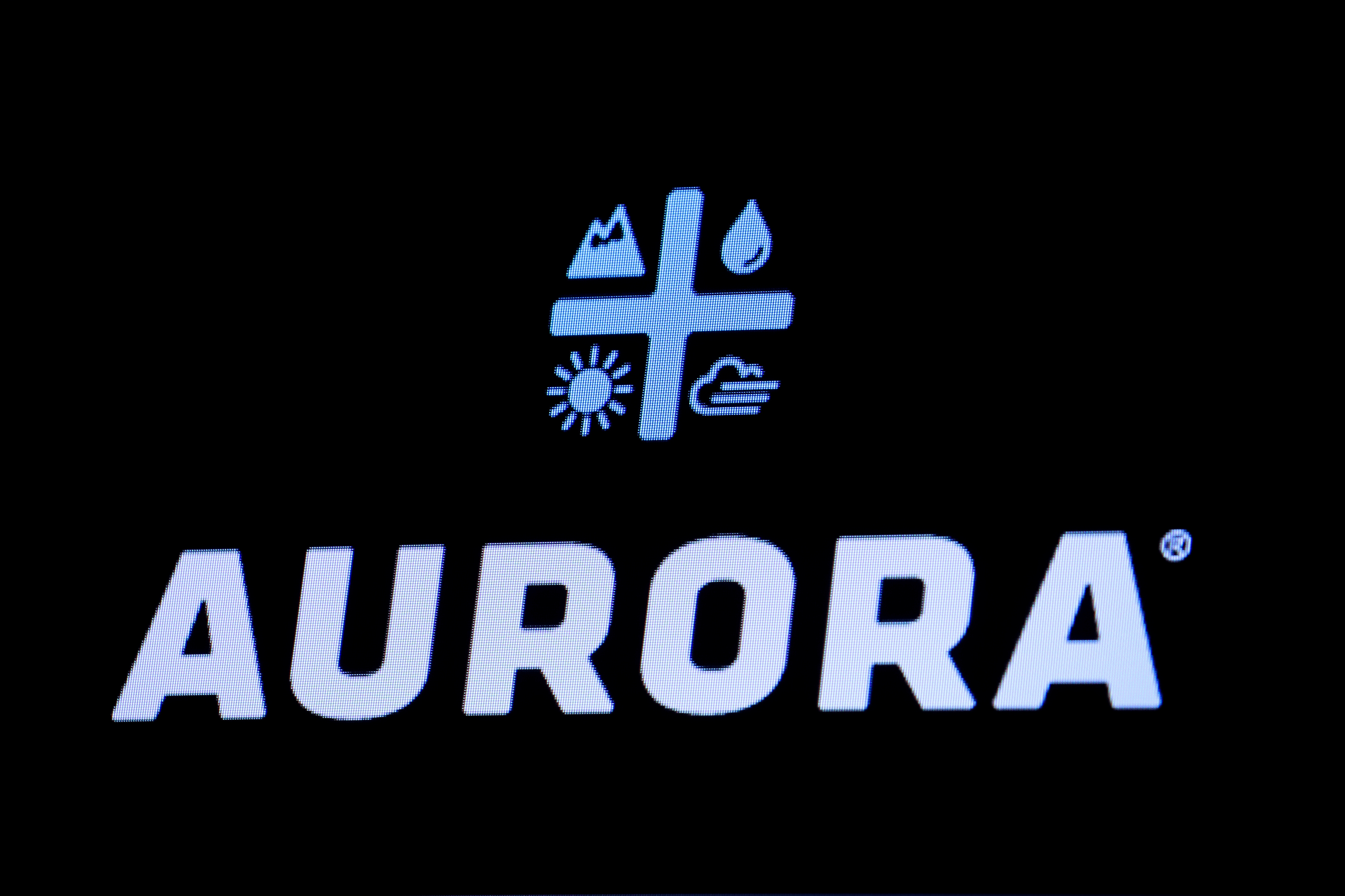 The Logo for Aurora Cannabis Inc., a Canadian licensed cannabis producer, is displayed on a screen on the floor of the NYSE in New York