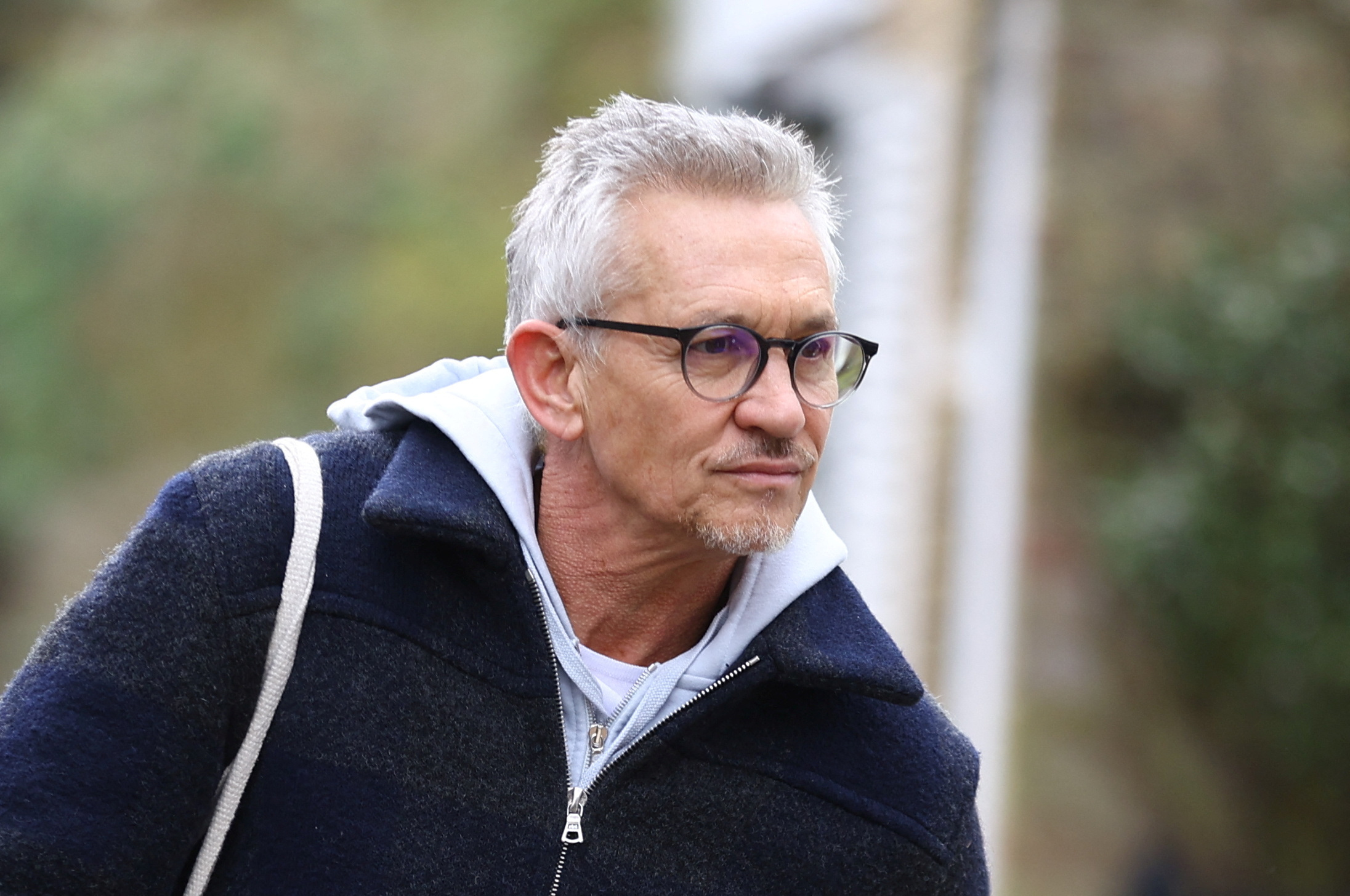 Football presenter Gary Lineker walks outside his home in London