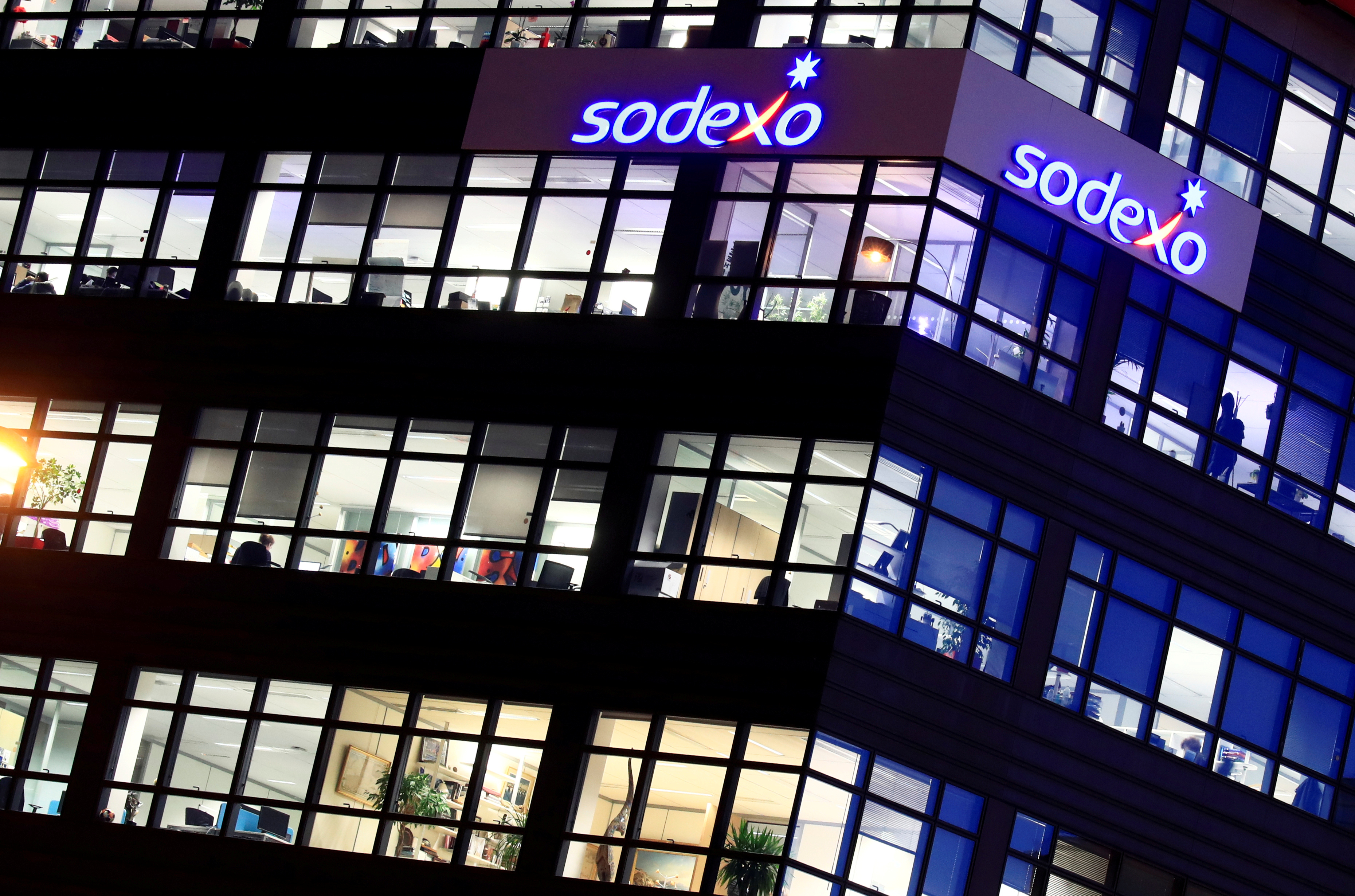 The logo of French food services and facilities management group Sodexo is seen at the company headquarters in Issy-les-Moulineaux near Paris
