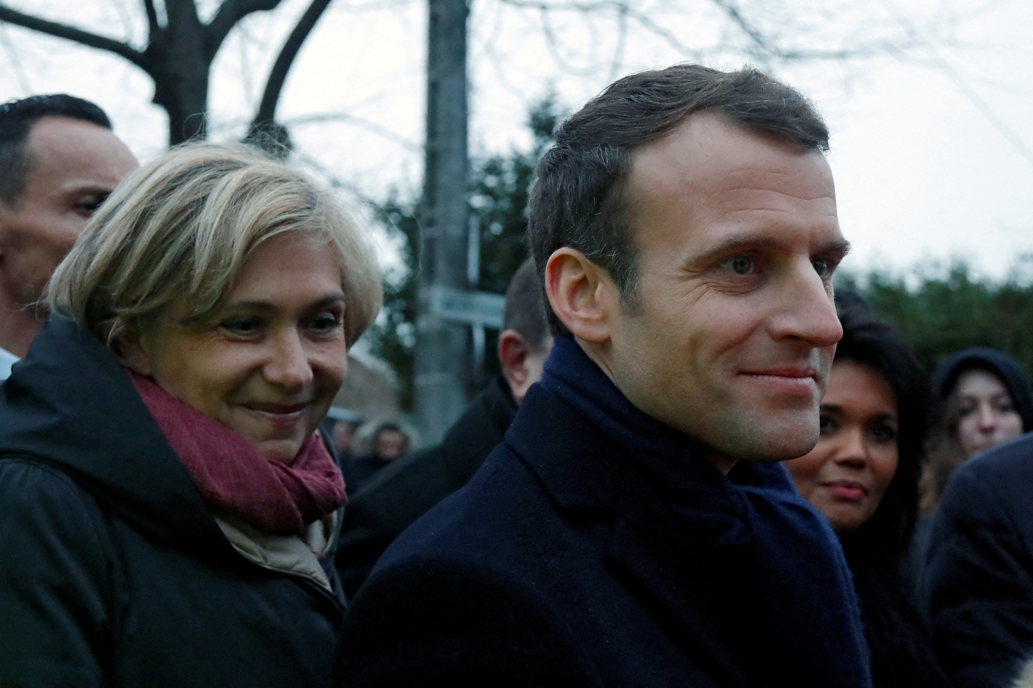 French President Emmanuel Macron and Valerie Pecresse, President of the Ile-de-France region, visit a neighborhood that suffered from flooding after days of heavy rains hit the country, in Villeneuve-Saint-Georges