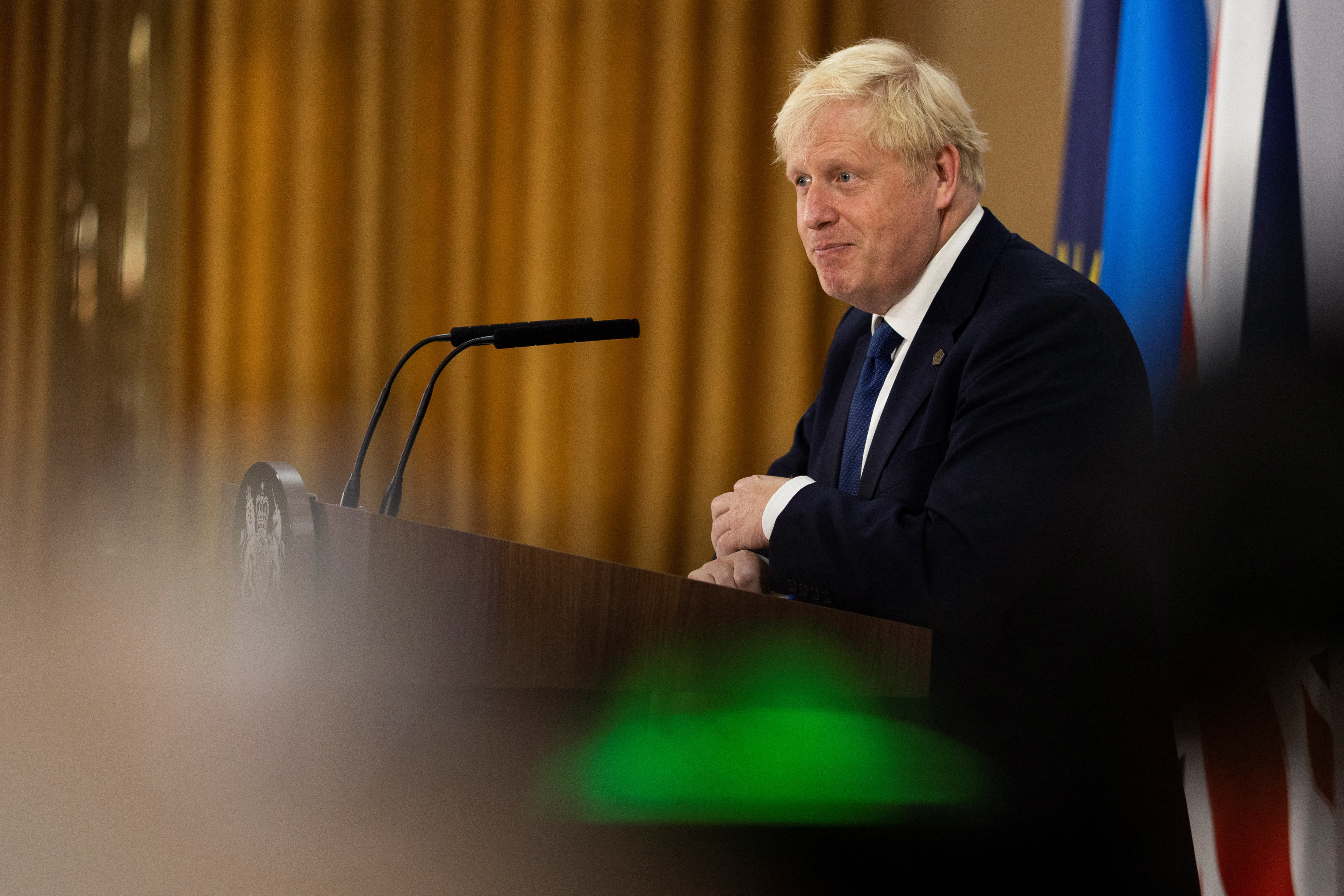 British Prime Minister Boris Johnson attends a news conference during the Commonwealth Heads of Government Meeting (CHOGM) at Lemigo Hotel, in Kigali