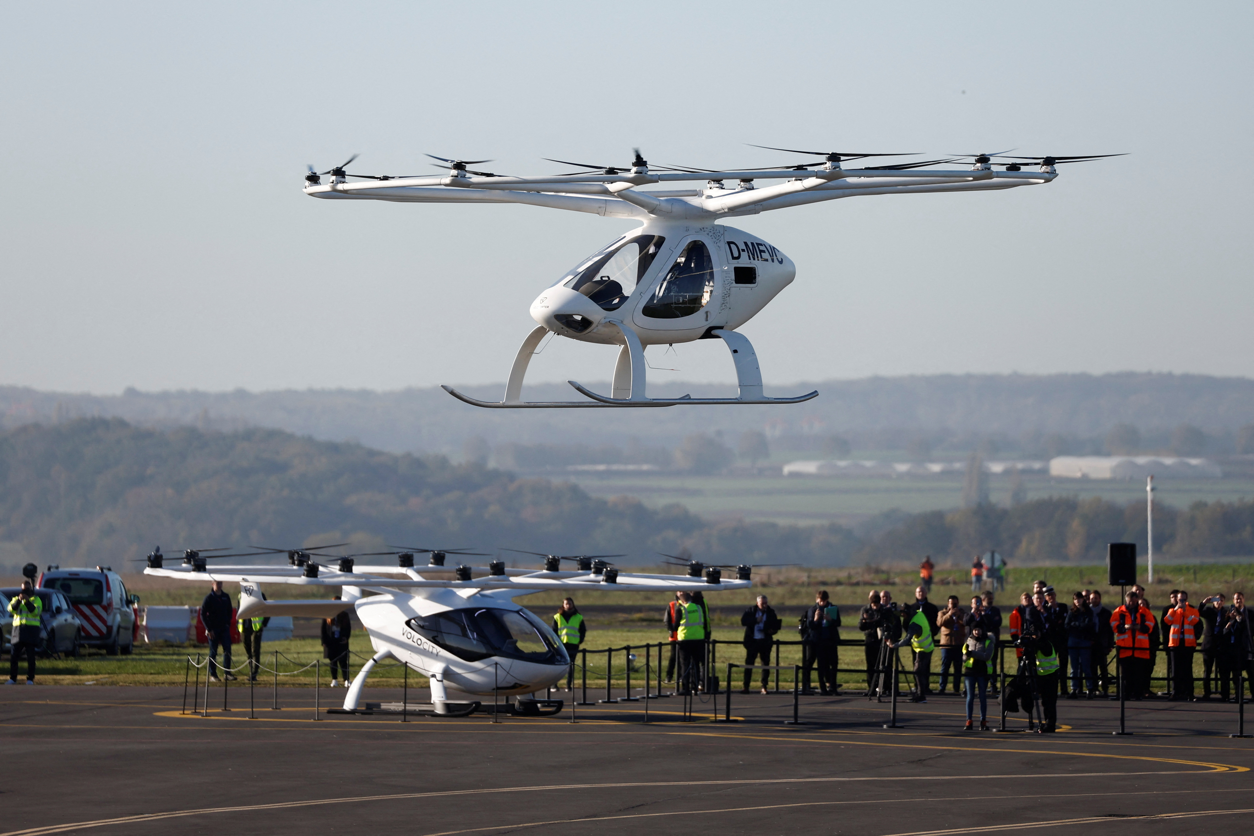 A Volocopter 2X drone taxi performs an integrated flight in conventional air traffic