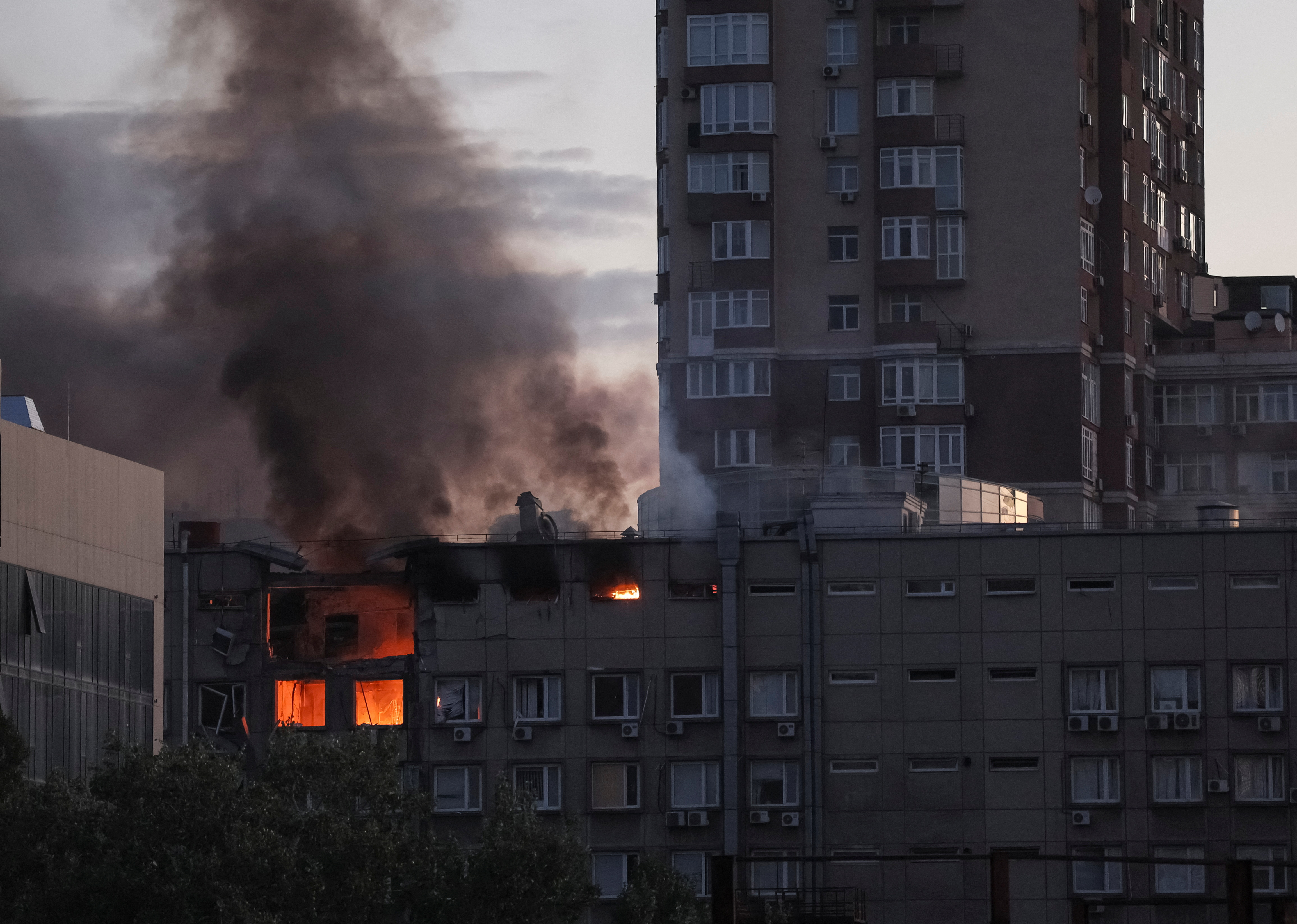 Smoke rises after a Russian drones strike in Kyiv
