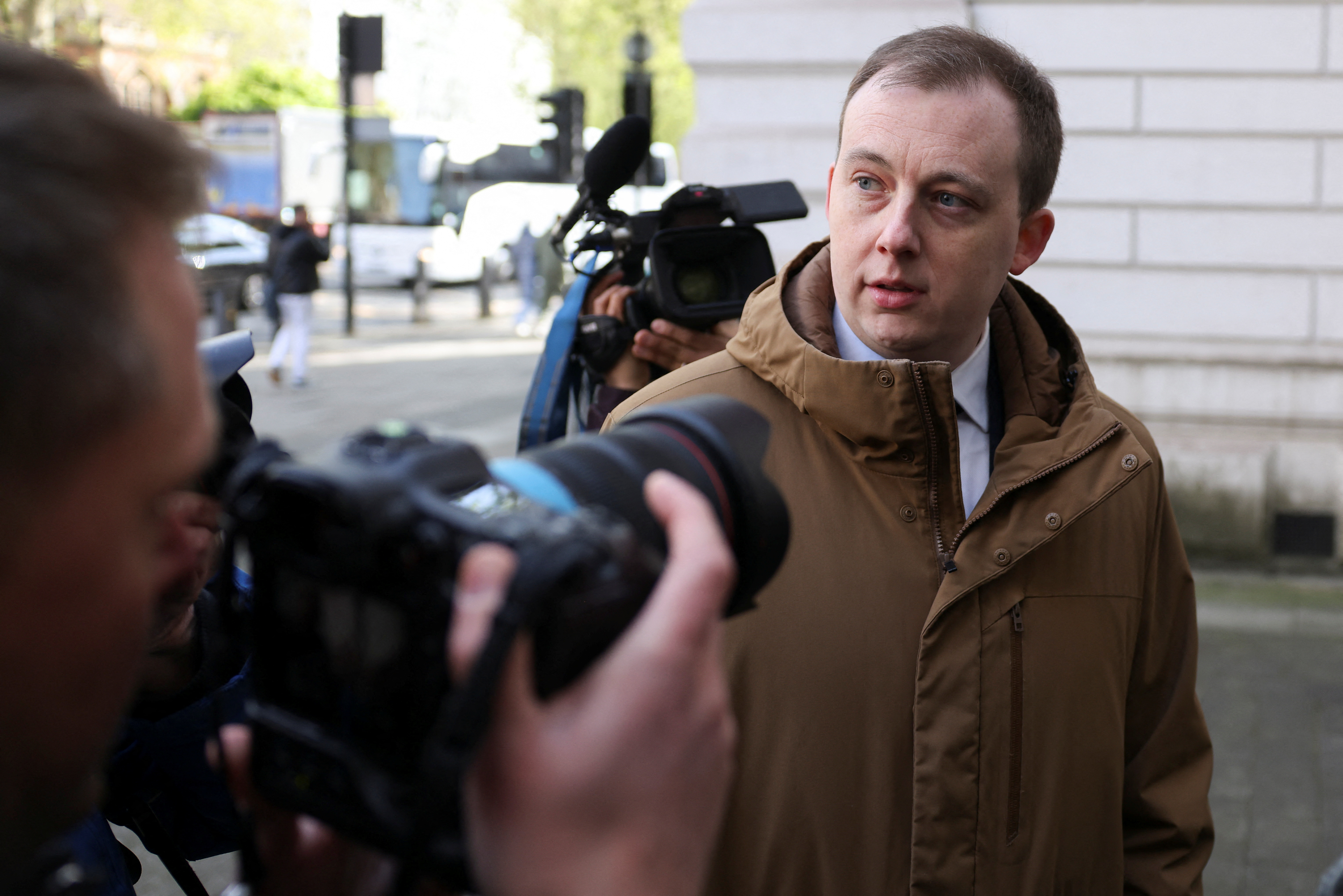 Two men to appear in UK court charged with spying for China eiqruidrziquxinv