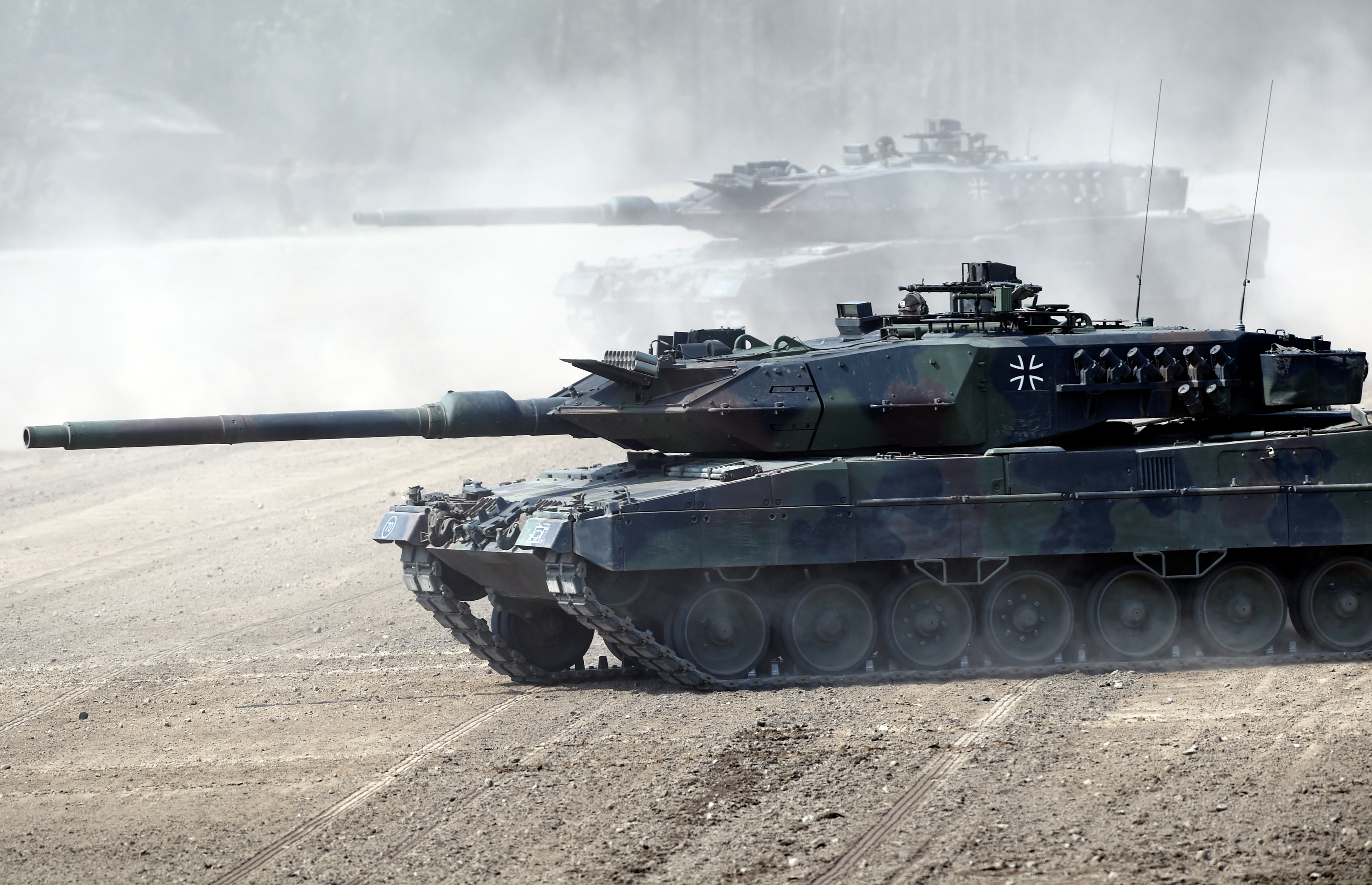 Leopard 2 tanks take position during a visit of German Chancellor Angela Merkel at NATO new spearhead force "VJTF 2019" in Munster