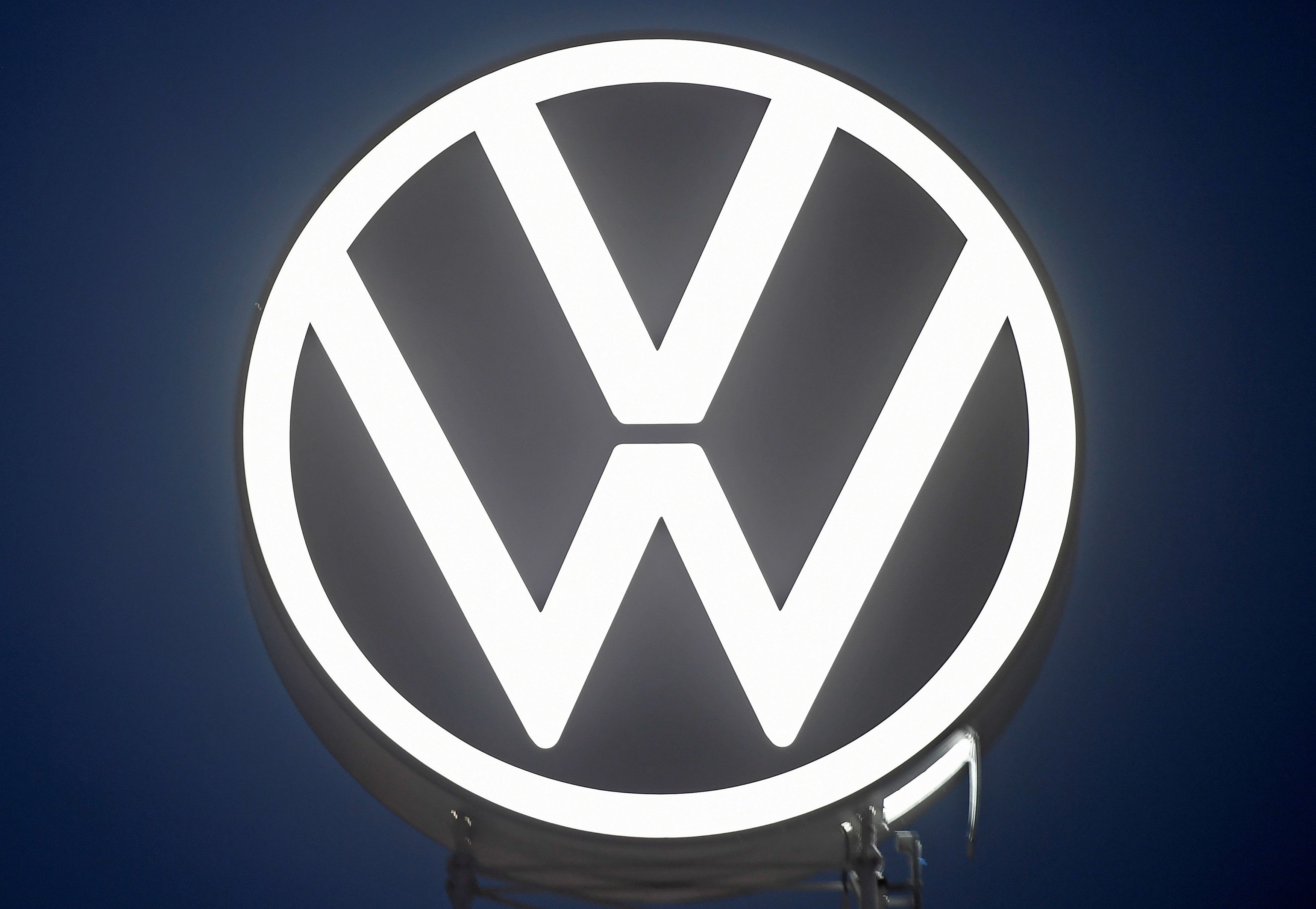 A new logo of German carmaker Volkswagen is unveiled at the VW headquarters in Wolfsburg