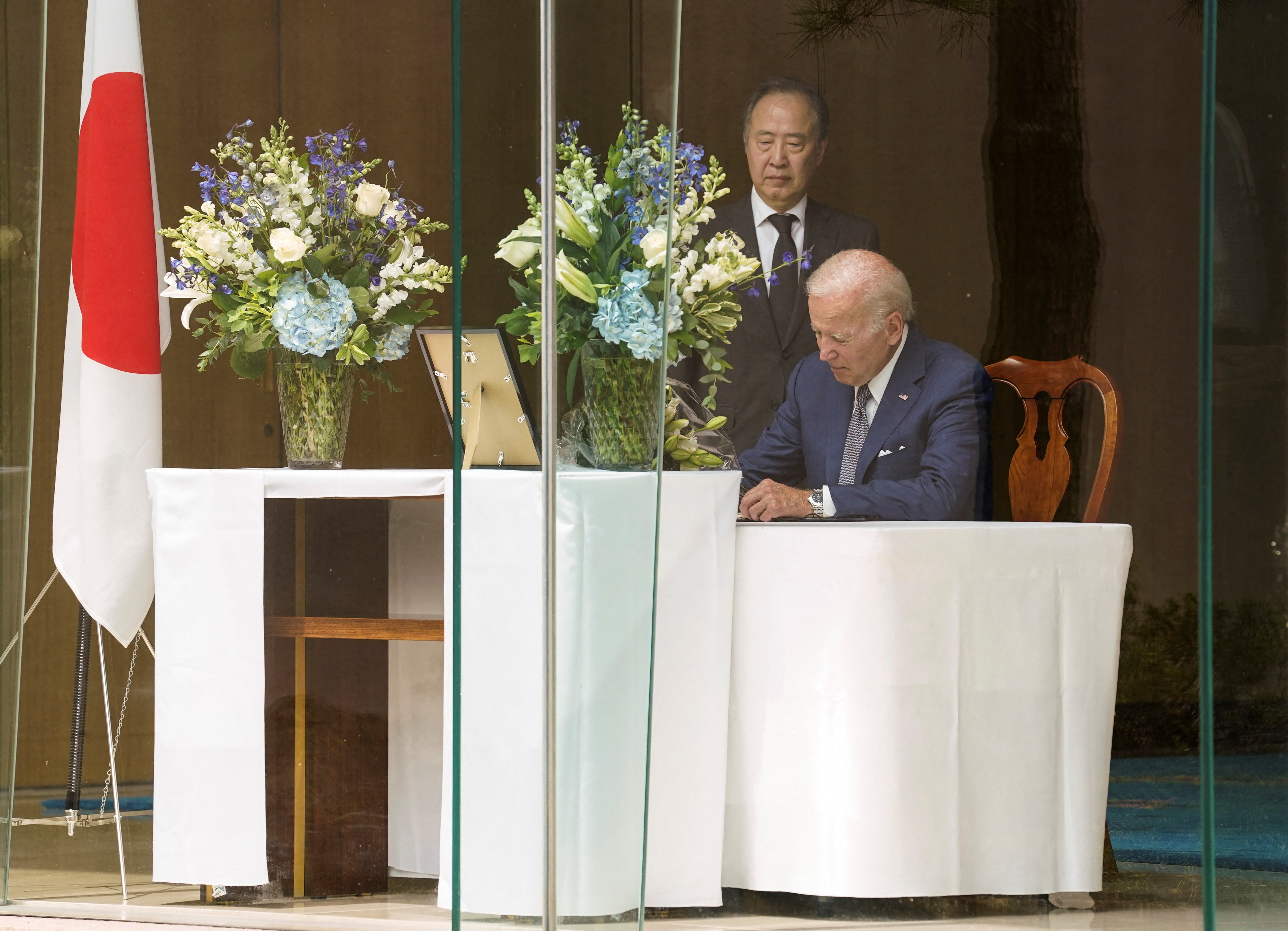 U.S. President Biden pays tribute to Japan's former Prime Minister Shinzo Abe during visit to the Japan ambassador's residence in Washington