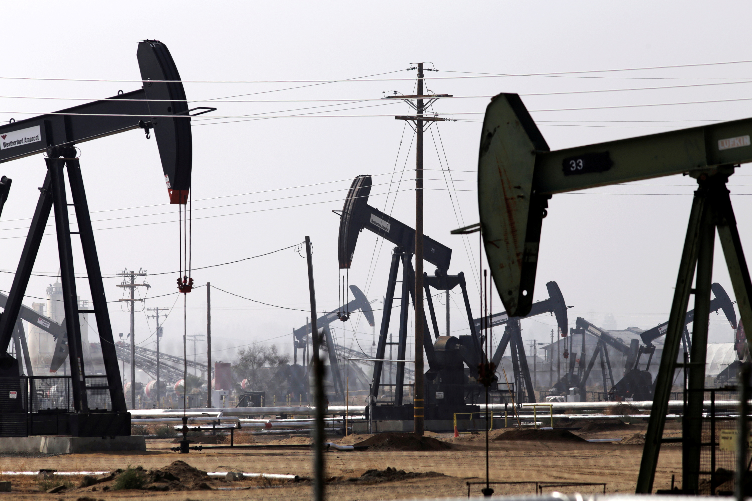 Oil drills are pictured in the Kern River oil field in Bakersfield