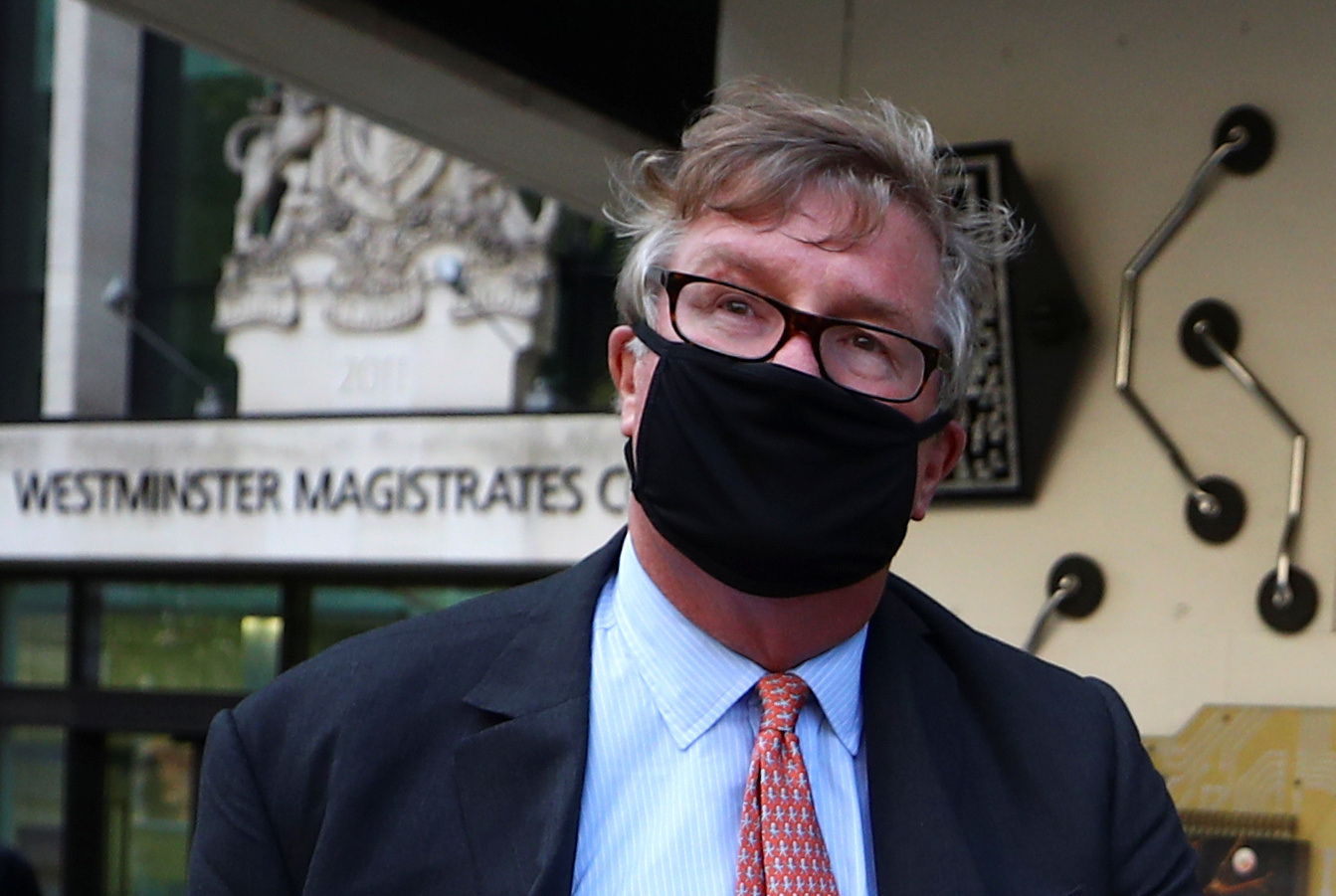 Britain's Crispin Odey leaves Westminster Magistrates Court in London
