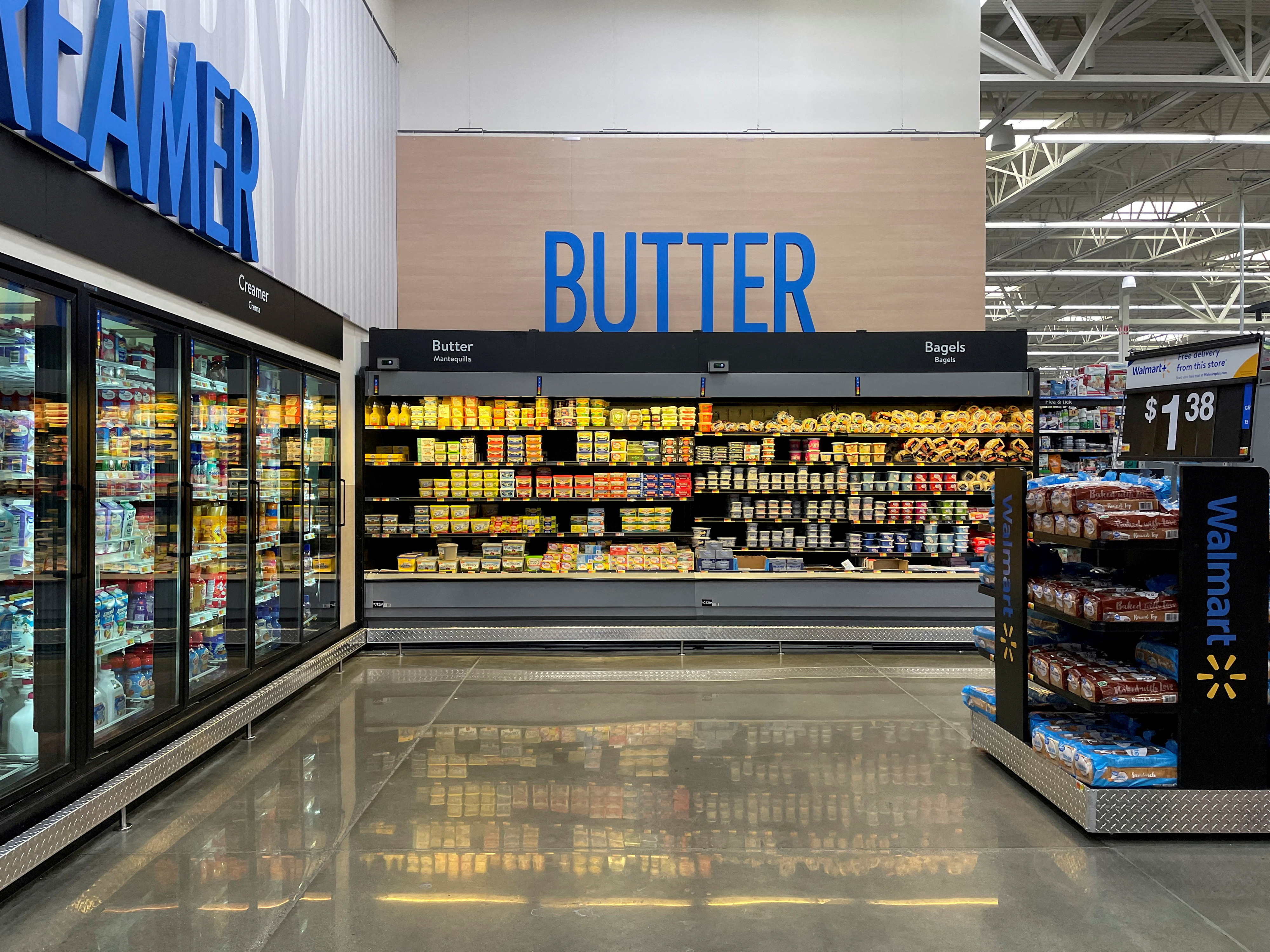 FILE PHOTO: View of an aisle with new signage at Walmart's newly remodeled Supercenter, in Teterboro