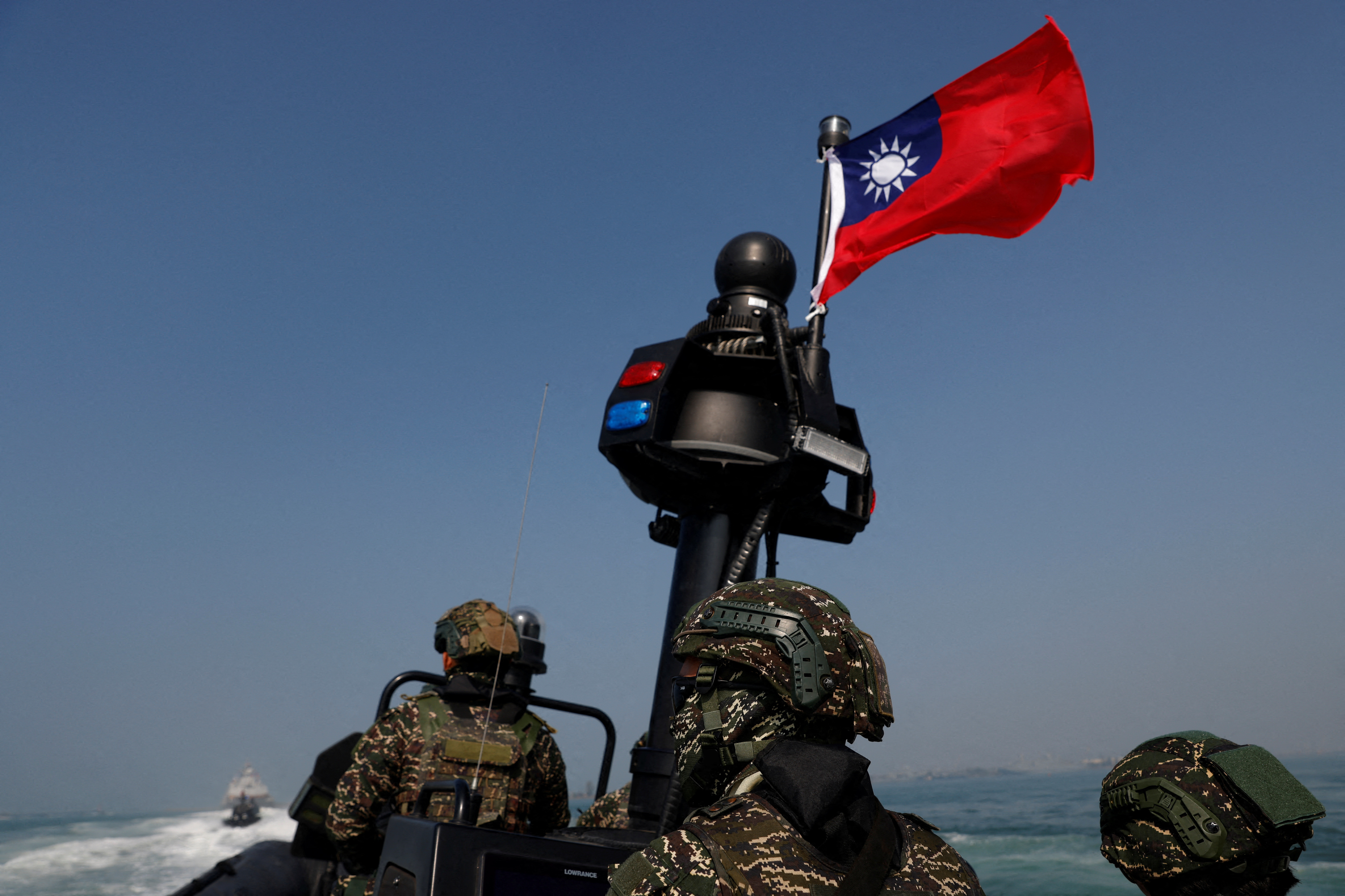 Members of Taiwan's Navy in a drill part of a demonstration for the media at a navy base in Kaohsiung