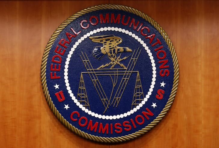 The Federal Communications Commission (FCC) logo is seen before the FCC Net Neutrality hearing in Washington