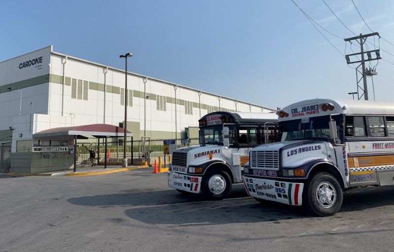 Commuter buses are parked outside the Tridonex auto-parts plant, owned by Philadelphia-based Cardone Industries, in Matamoros