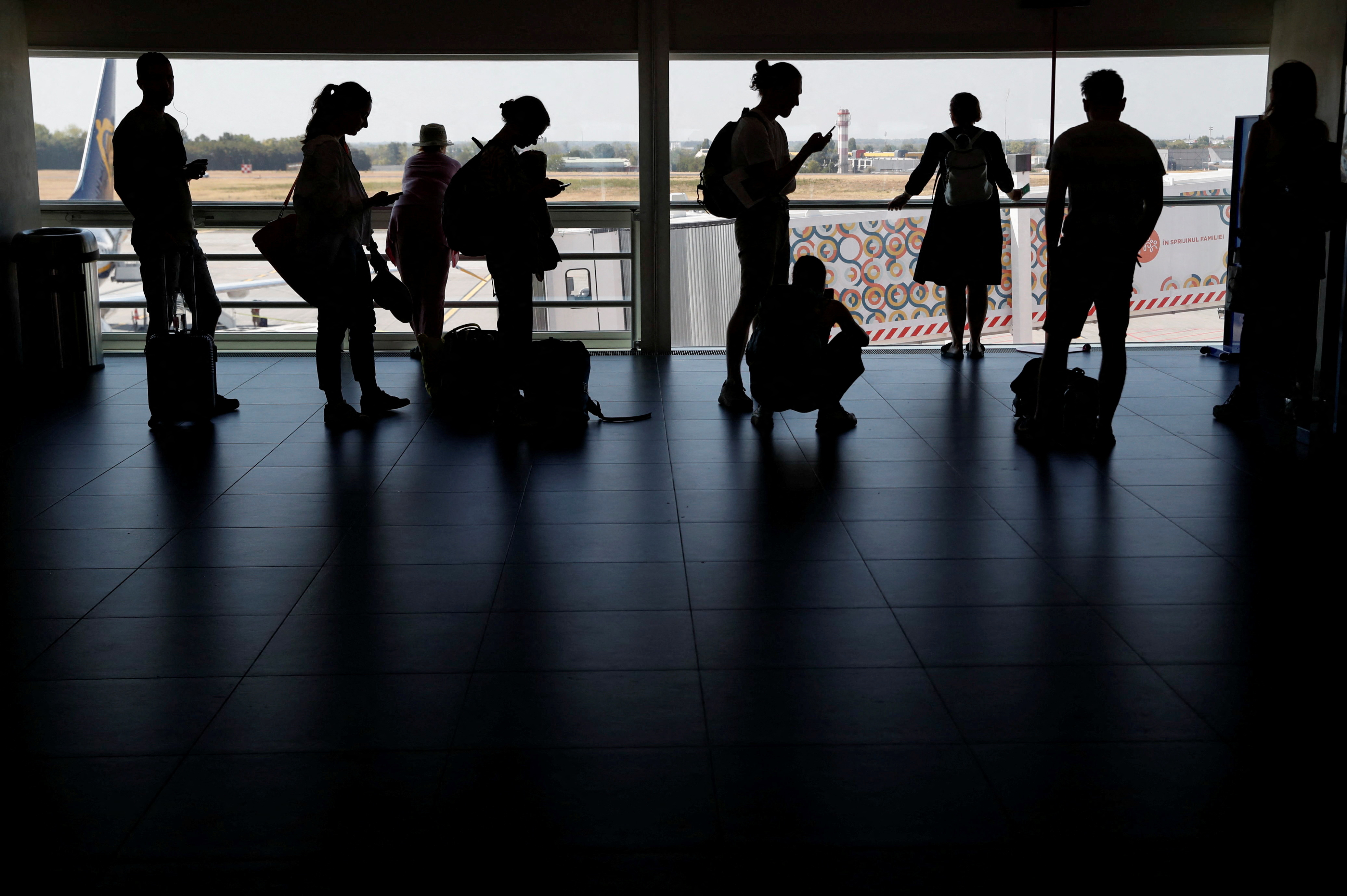 Passangers wait at Pier B of Ferenc Liszt International Airport in Budapest