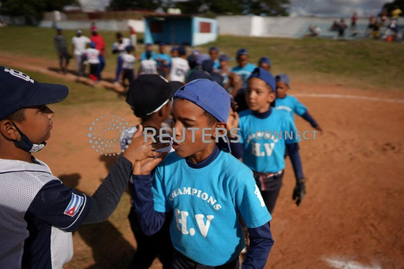 The Wider Image: Young Cuban ballplayers dream of U.S. major leagues