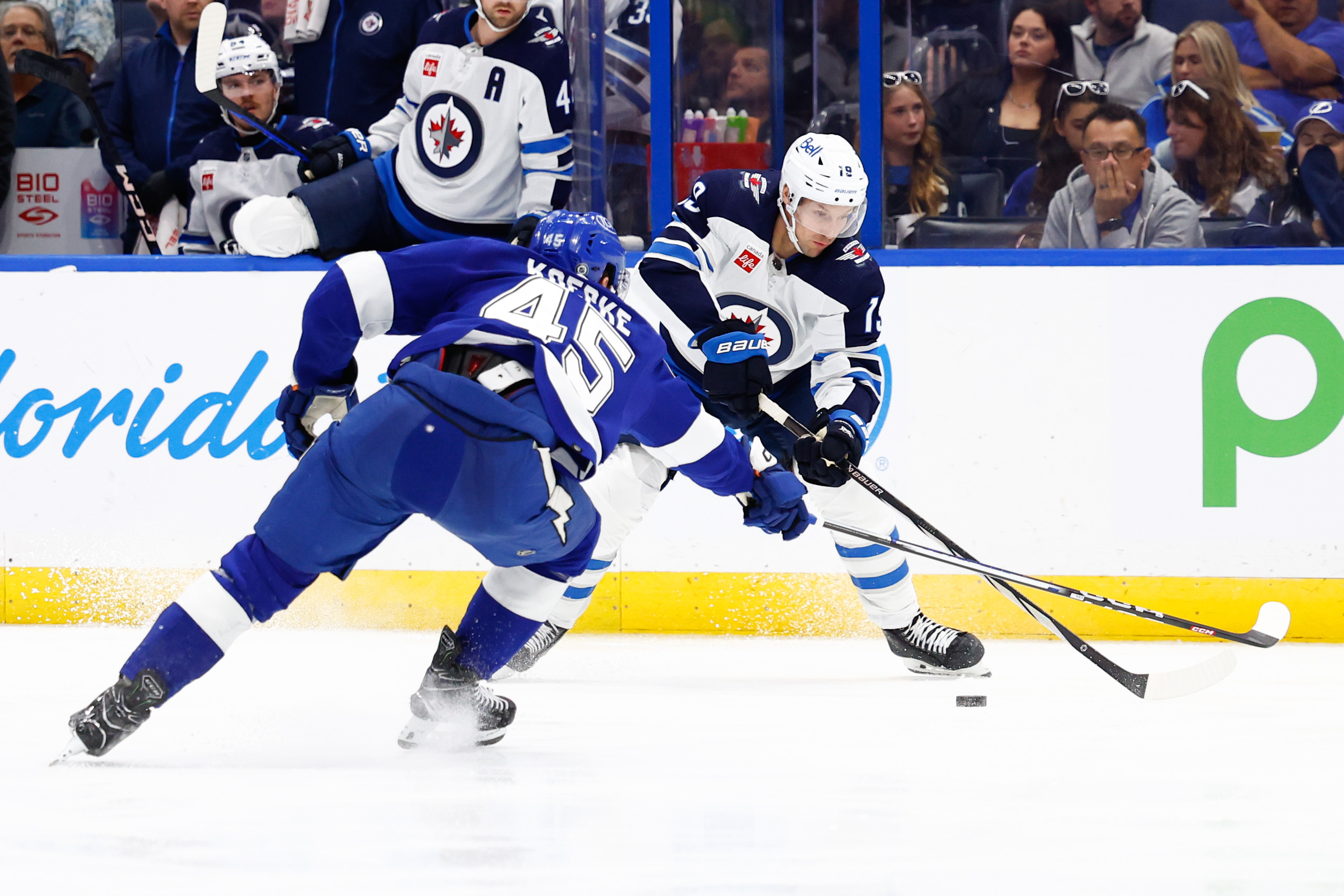 Adam Lowry Leads Jets Past Lightning In Overtime | Reuters