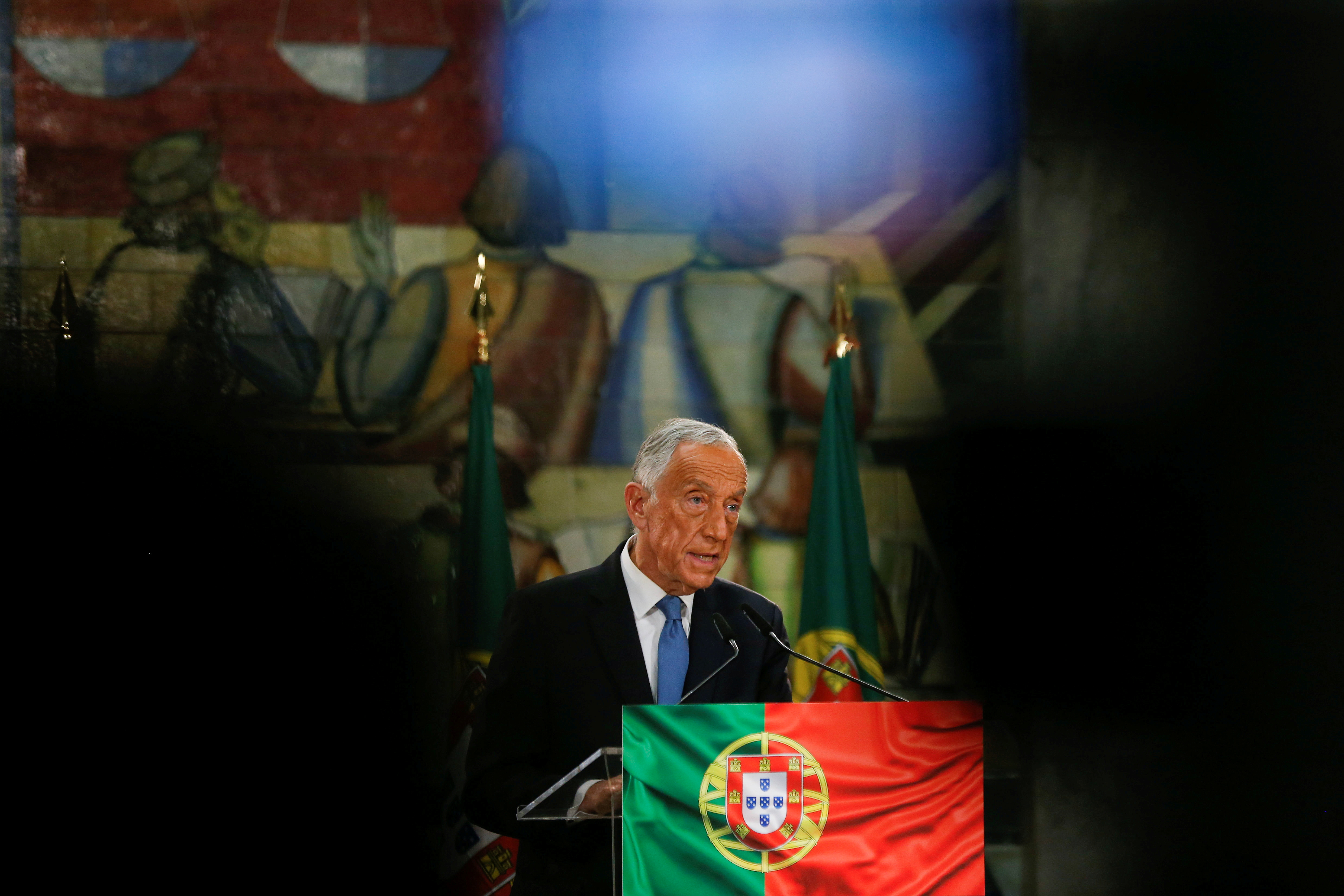 Re-elected Portugal's President Marcelo Rebelo de Sousa addresses journalists after the announcement of electoral results in Lisbon