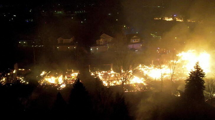 General view of burnt down houses in a neighbourhood in Superior