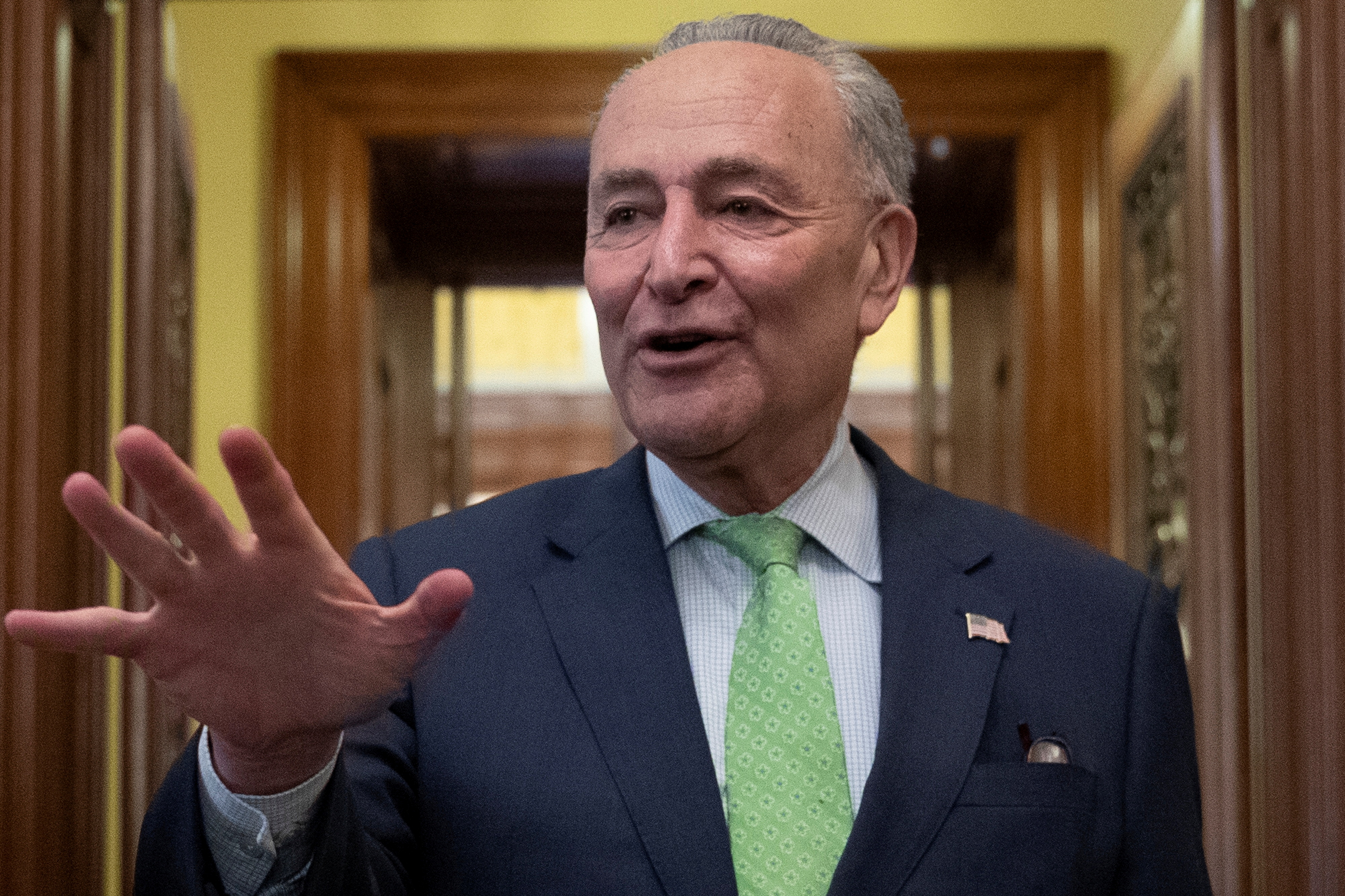 Senate Majority Leader Schumer speaks to news reporters following a deal on infrastructure on Capitol Hill in Washington
