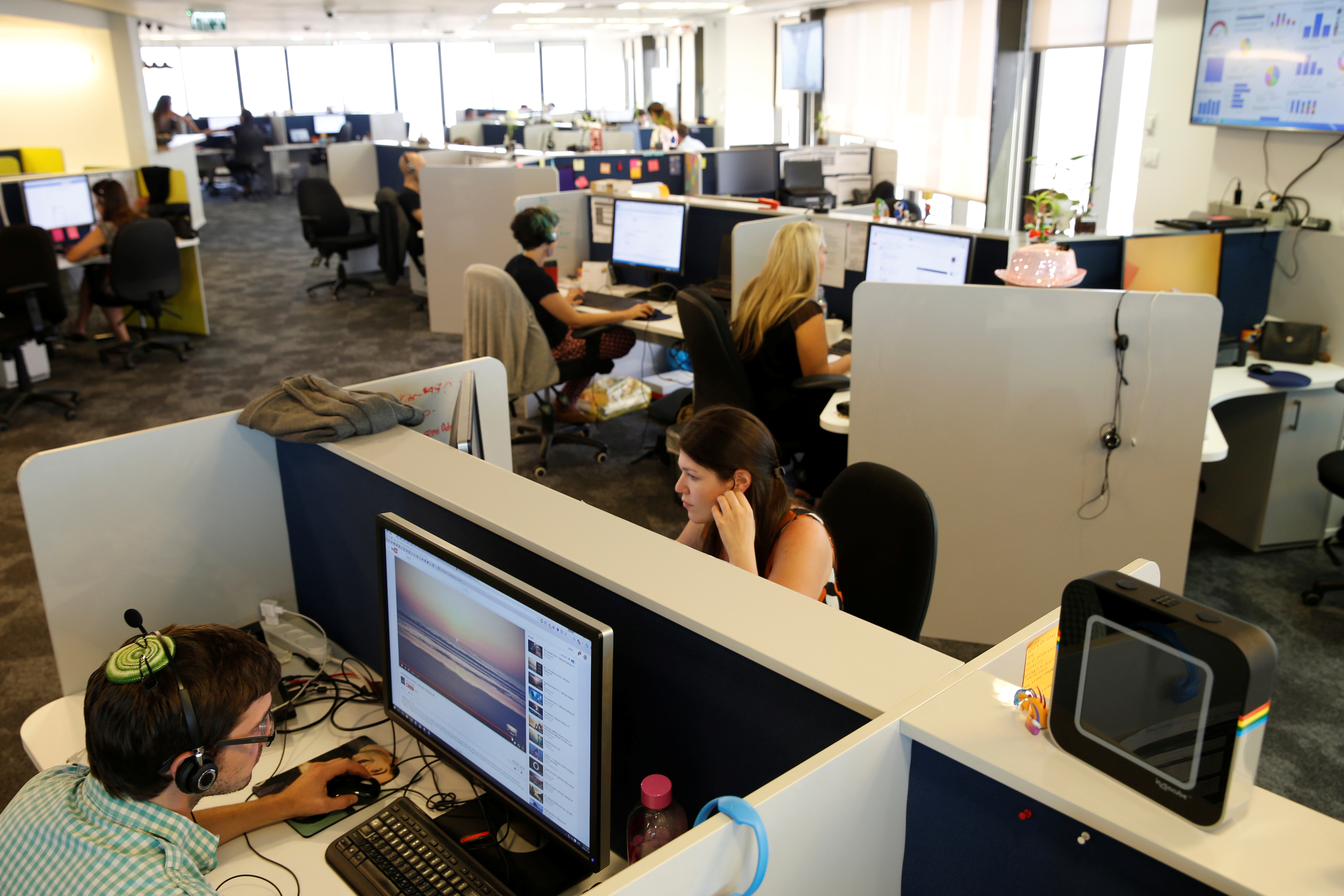Employees work at Internet data firm SimilarWeb at their offices in Tel Aviv, Israel