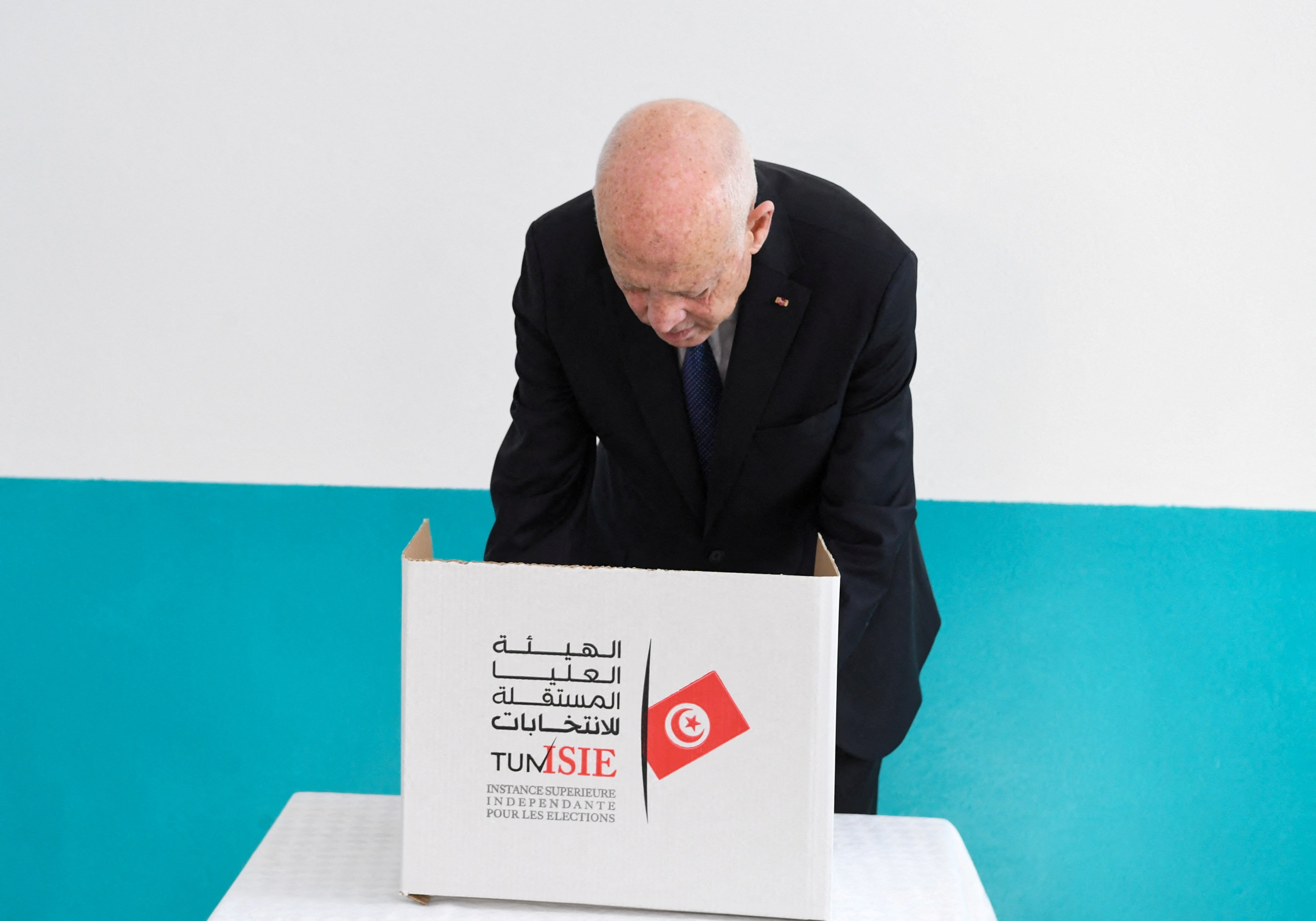 Tunisia's President Kais Saied prepares to vote during presidential election in Tunis