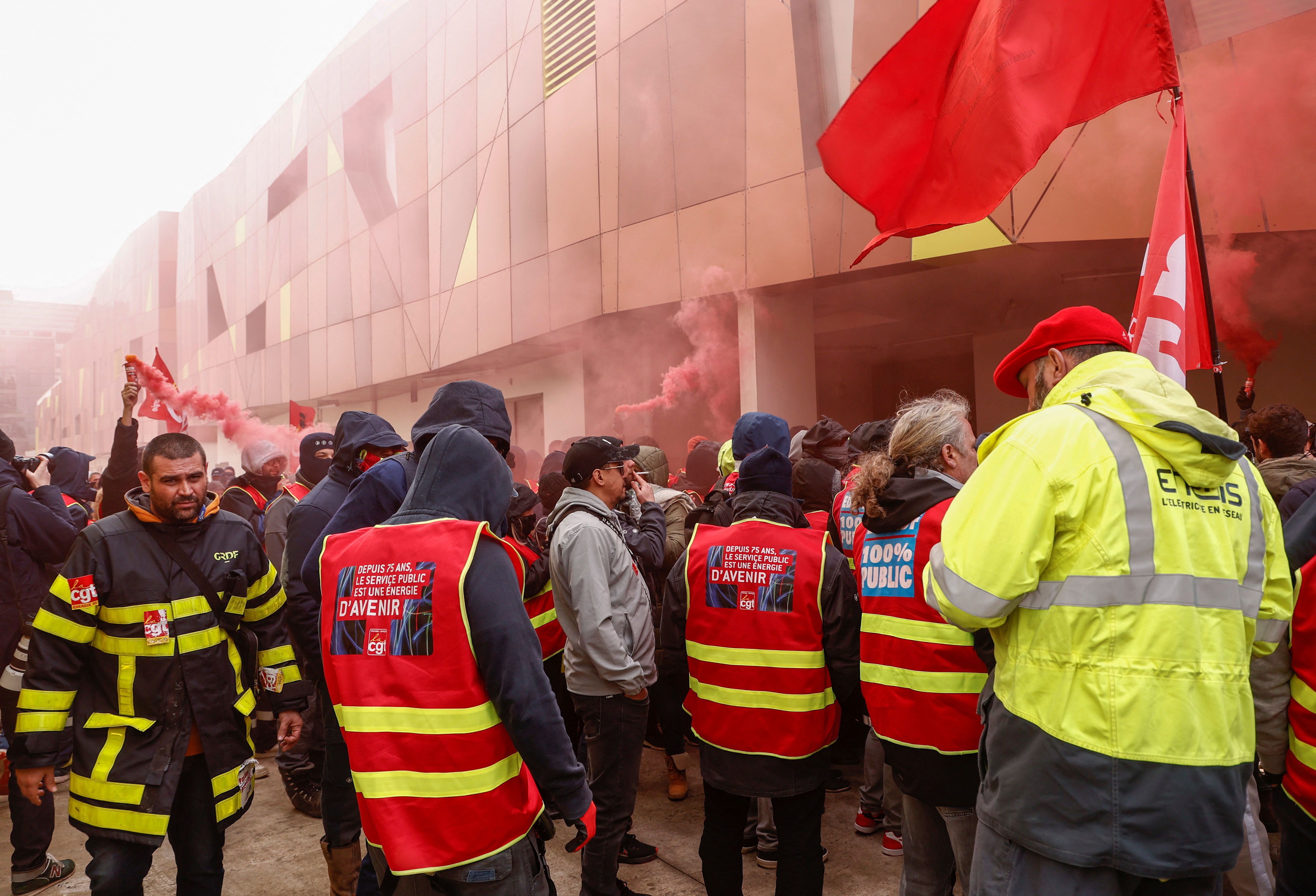 Striking workers cut power to the large sports arena Stade de France and the Olympic village near Paris