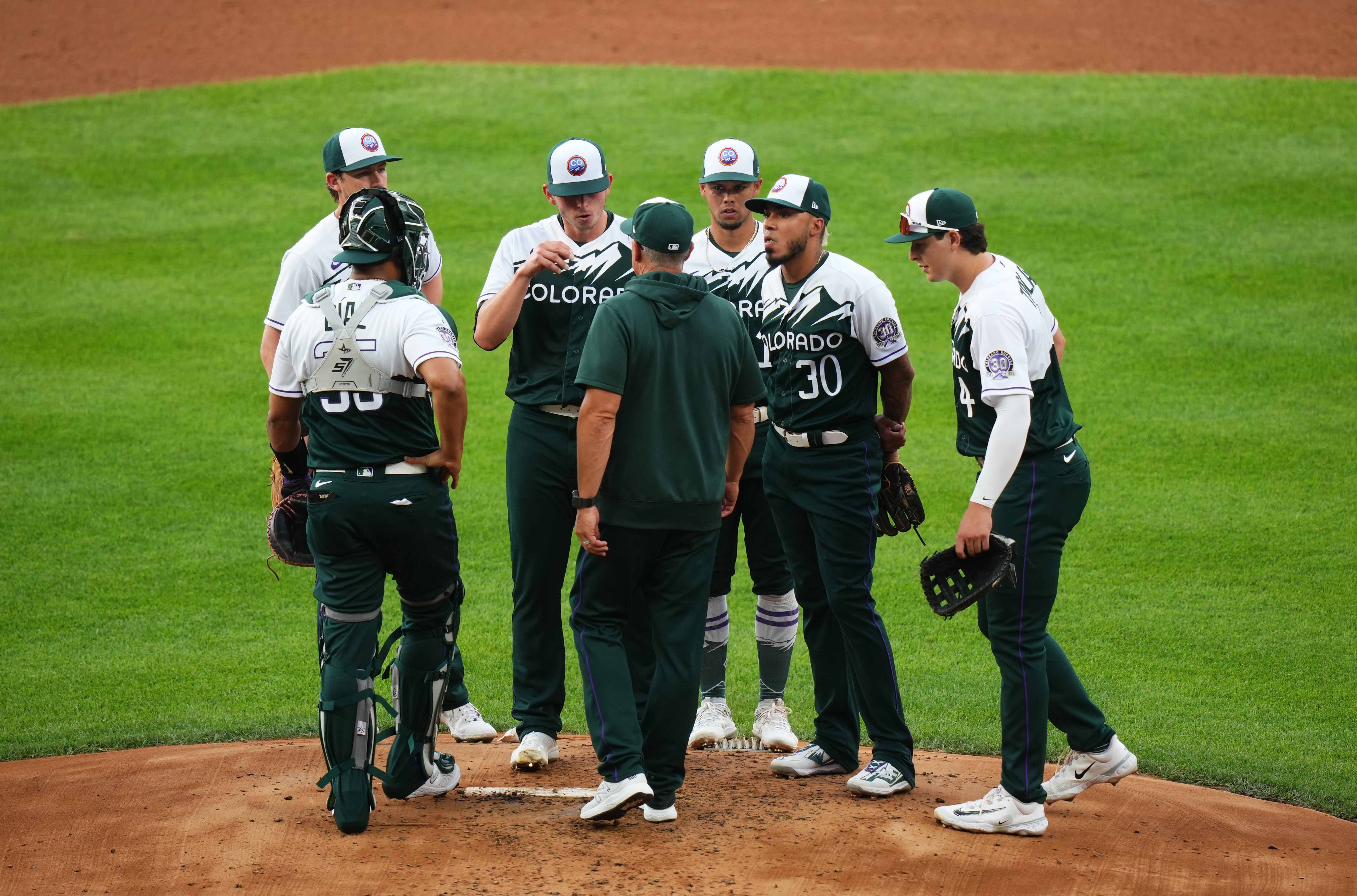 A's explode for 11 runs in walloping Rockies