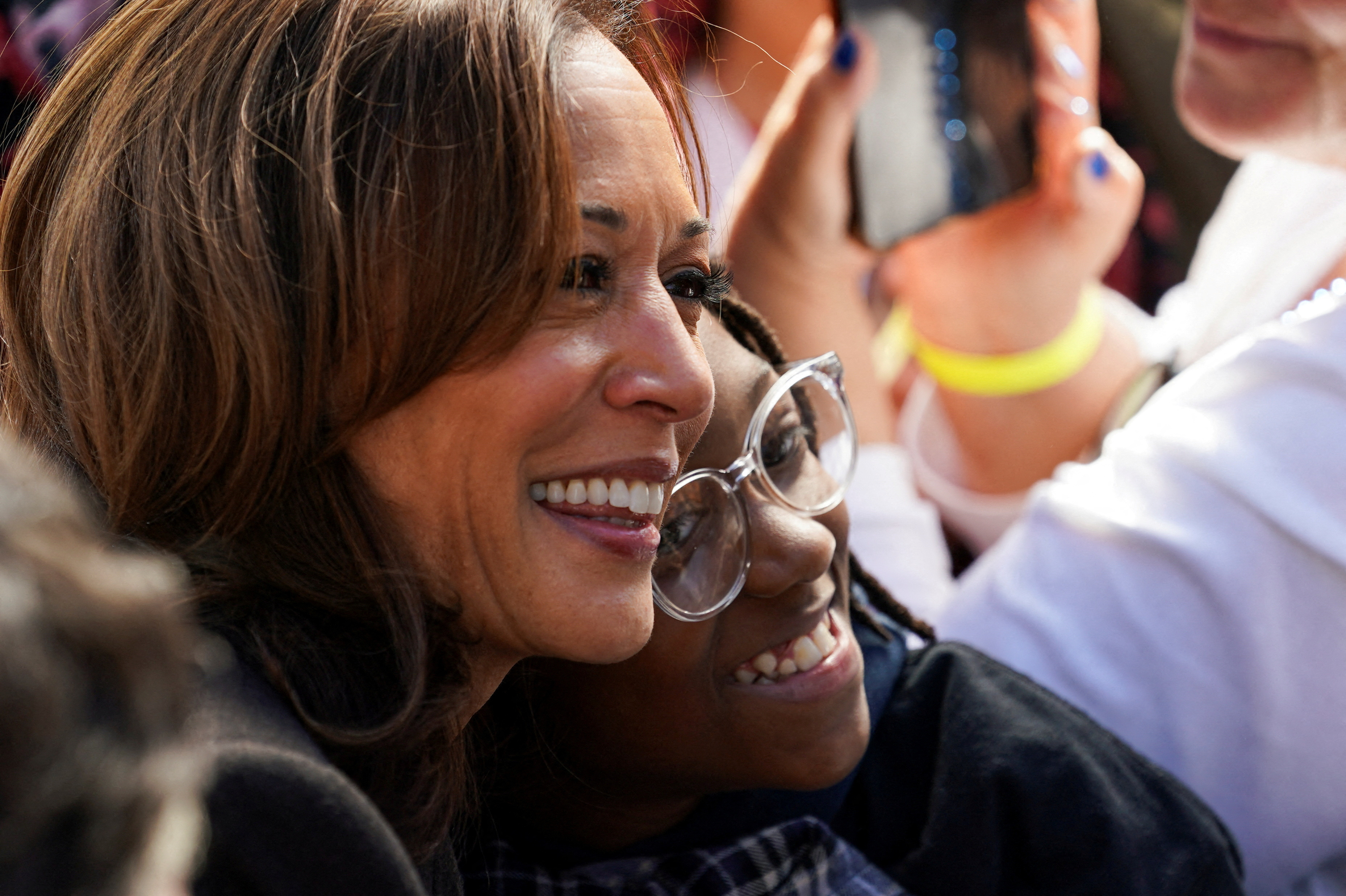 Harris, Trump barnstorm Michigan, spar over who has stamina Reuters