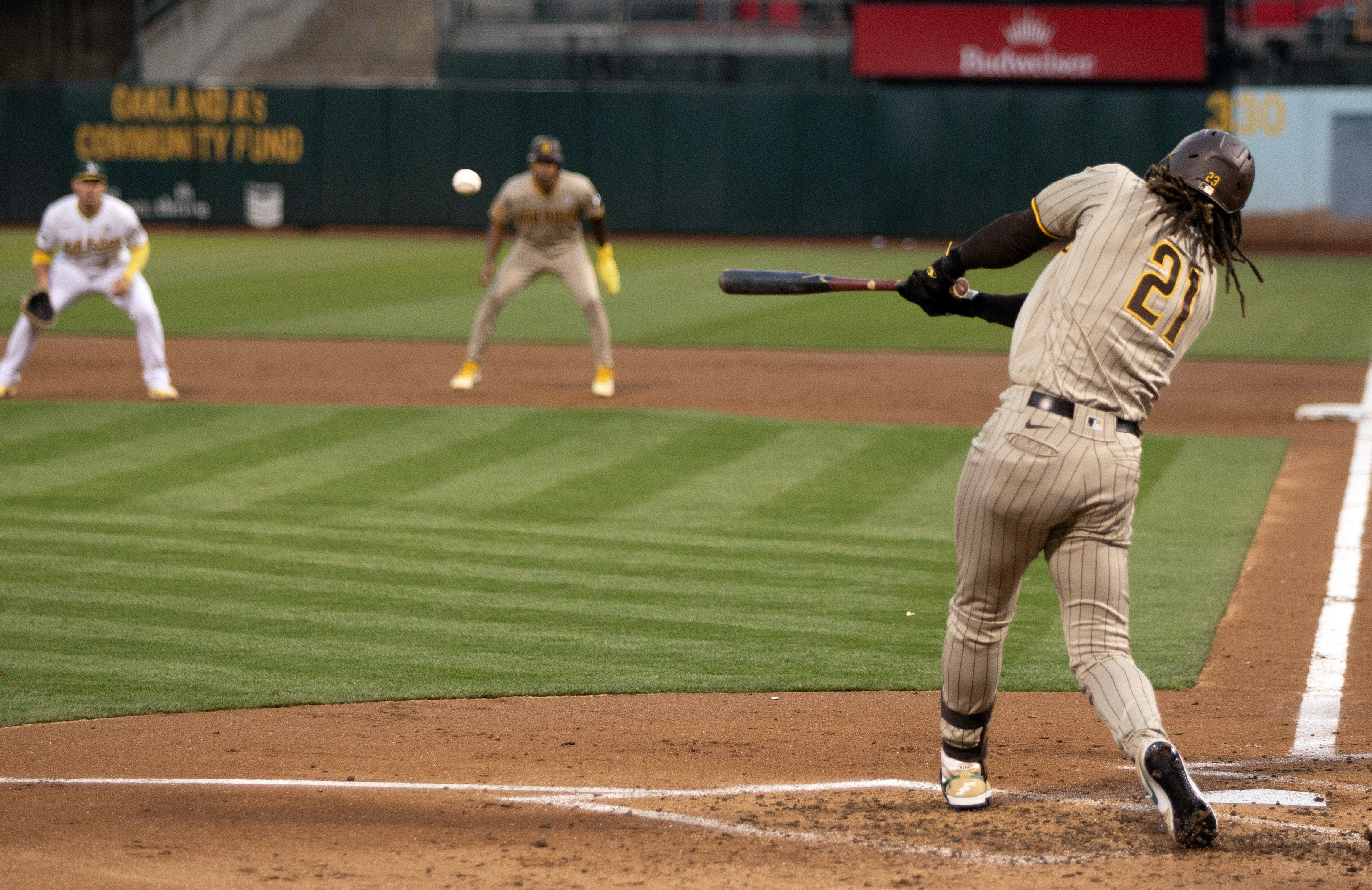 San Diego Padres Jose Azocar takes off his Nike batting gloves