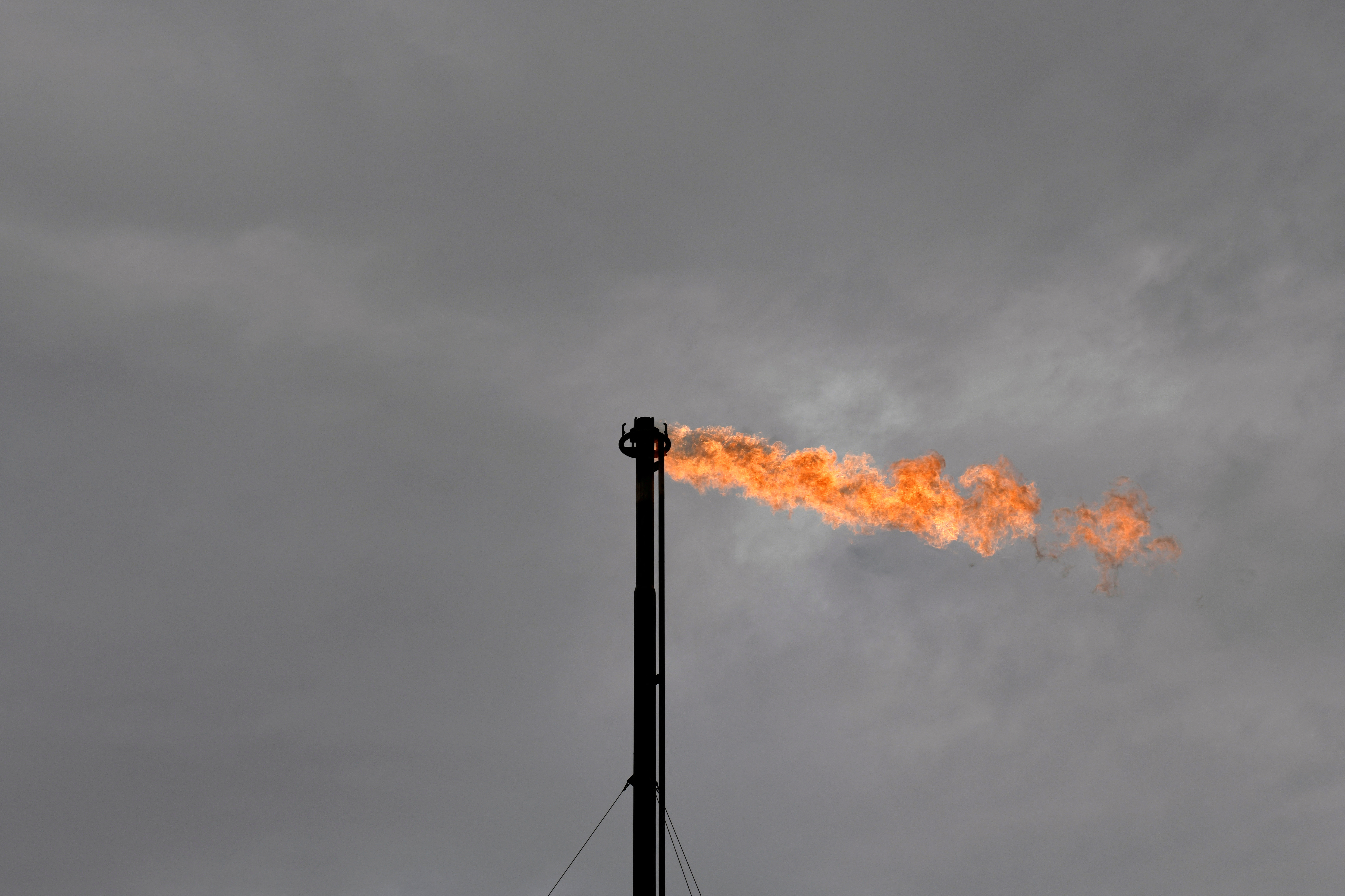 Natural gas flares off at a production facility owned by Exxon near Carlsbad, New Mexico, United States