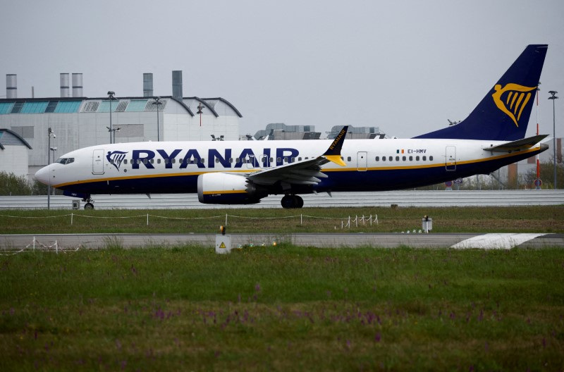 FILE PHOTO: A Ryanair Boeing 737 MAX 8-200 Aircraft prepares to take off from the Nantes Atlantique Airport in Bouguenais, France