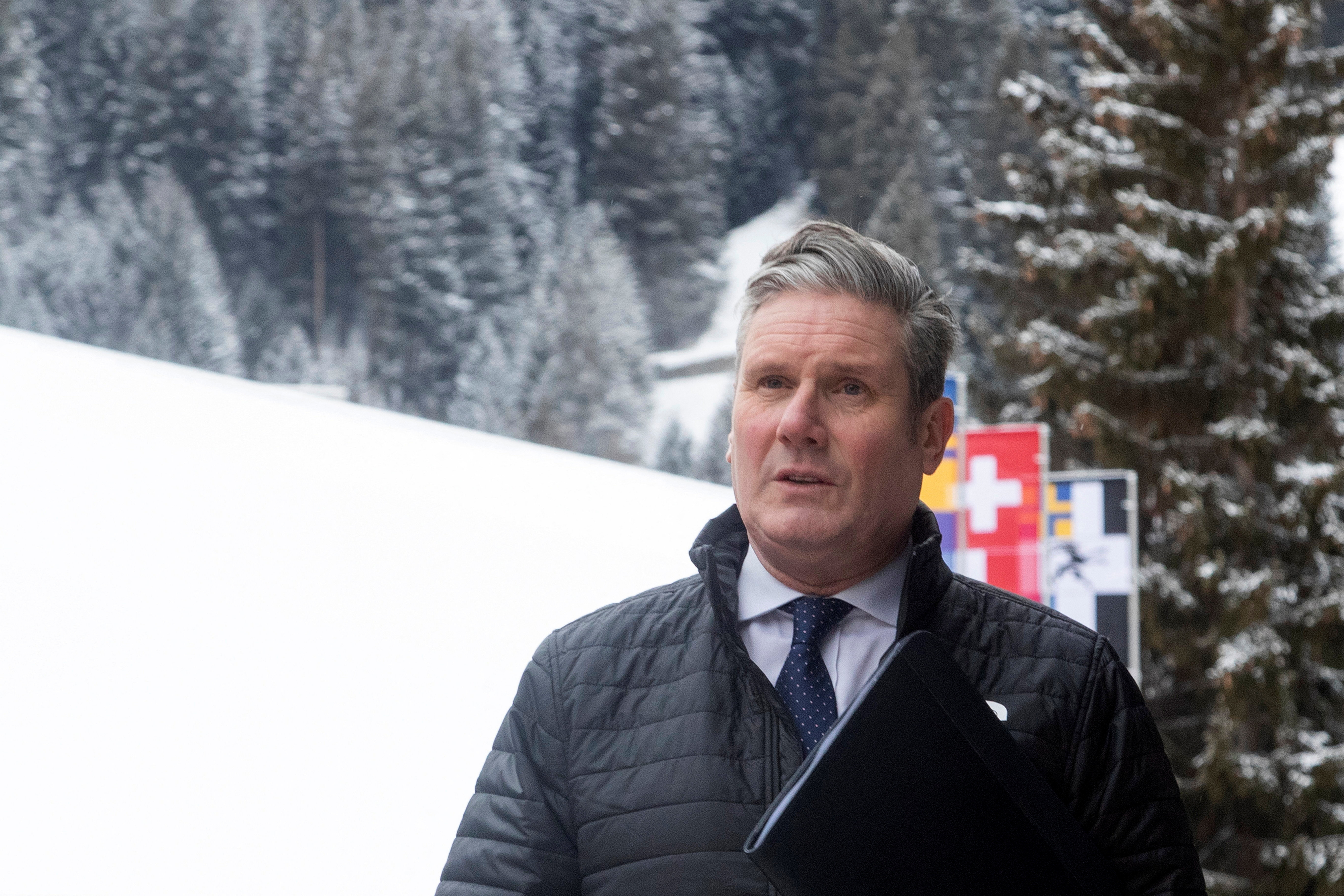 Britain's Labour leader Starmer walks to a meeting during the World Economic Forum in Davos
