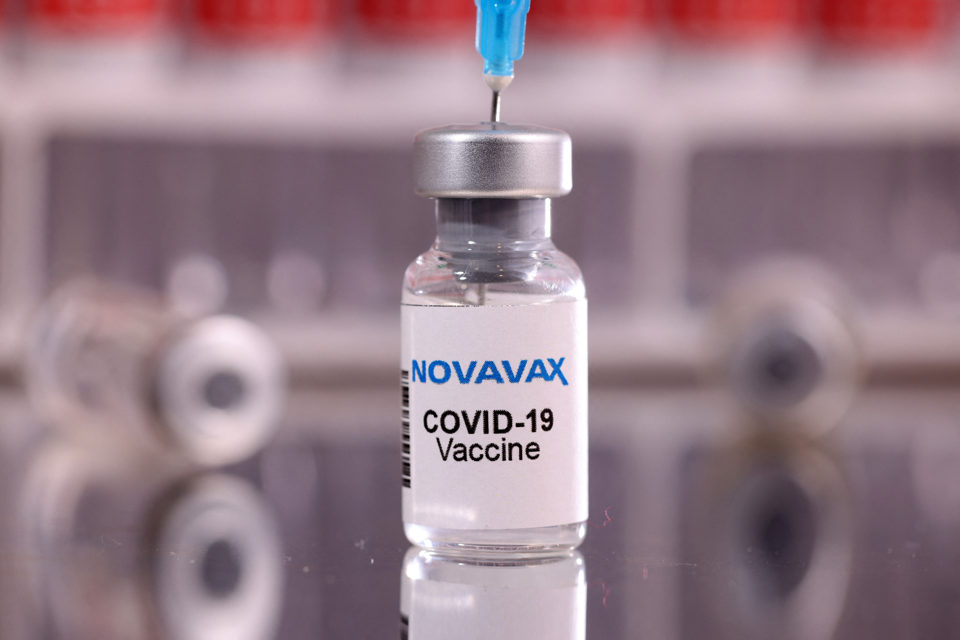 Breaking News Illustration of COVID-19 vaccine vial