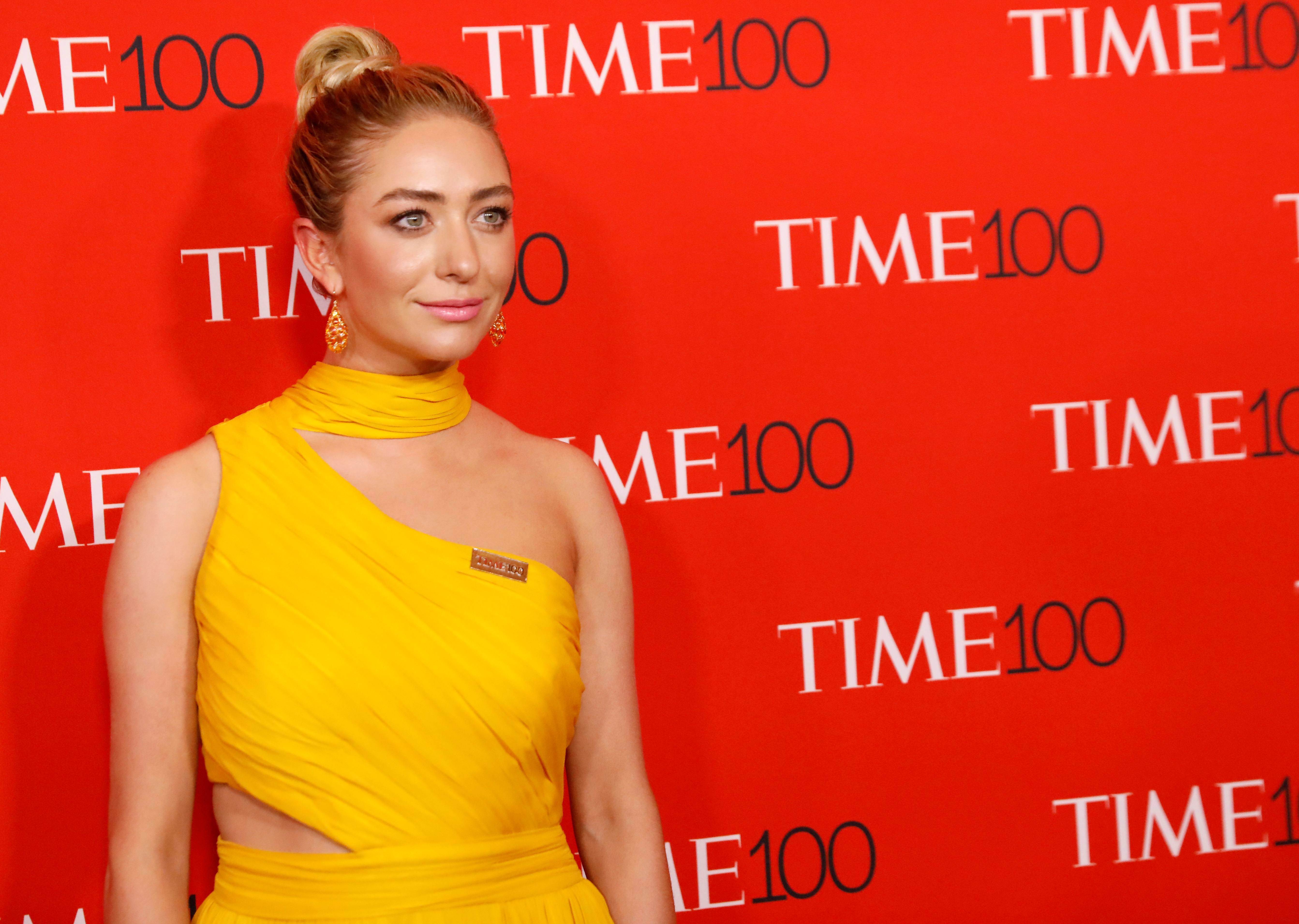 Bumble CEO Whitney Wolfe Herd has her photo taken on the red carpet after arriving for the TIME 100 Gala in Manhattan, New York