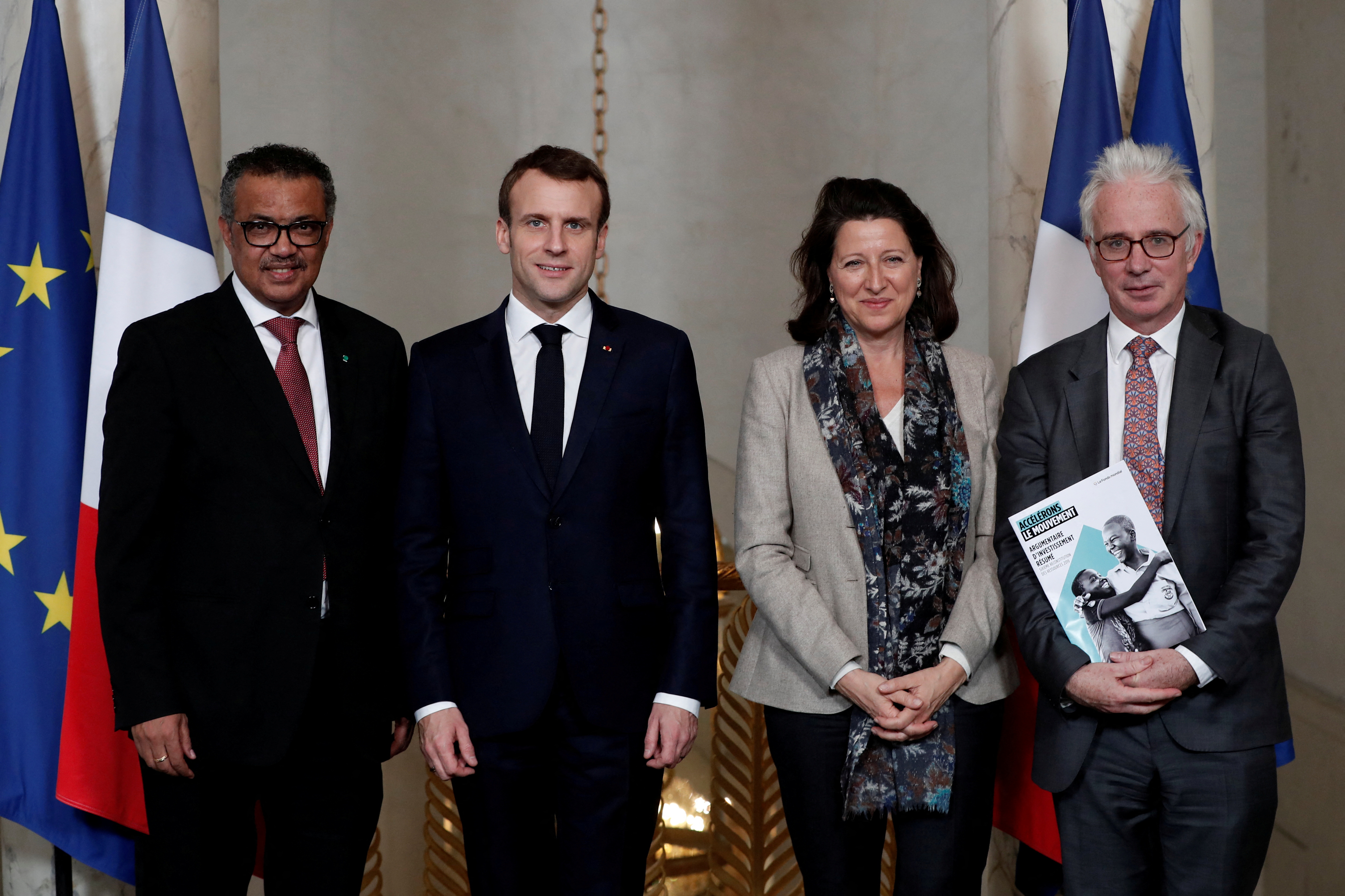 French President Emmanuel Macron, Tedros Adhanom Ghebreyesus, Director-General of World Health Organization, Agnes Buzyn, French Minister for Solidarity and Health, and Peter Alexander Sands pose at the Elysee Palace in Paris