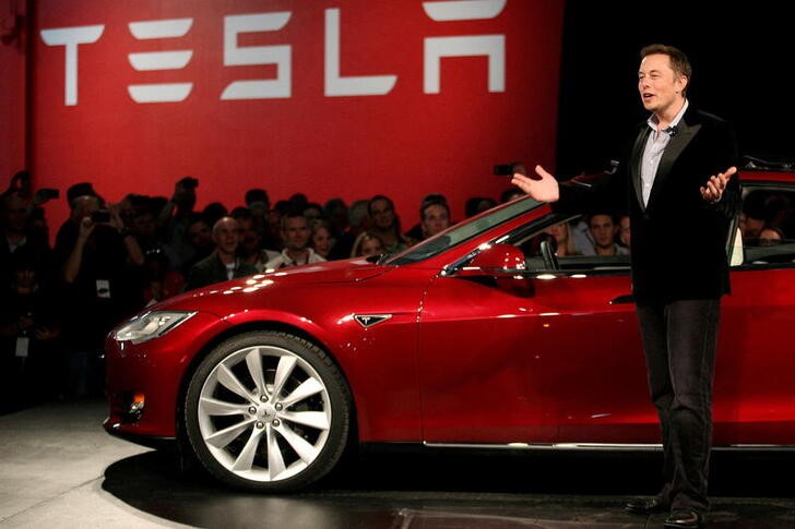 Paris taxi driver files lawsuit against Tesla after fatal crash | Reuters