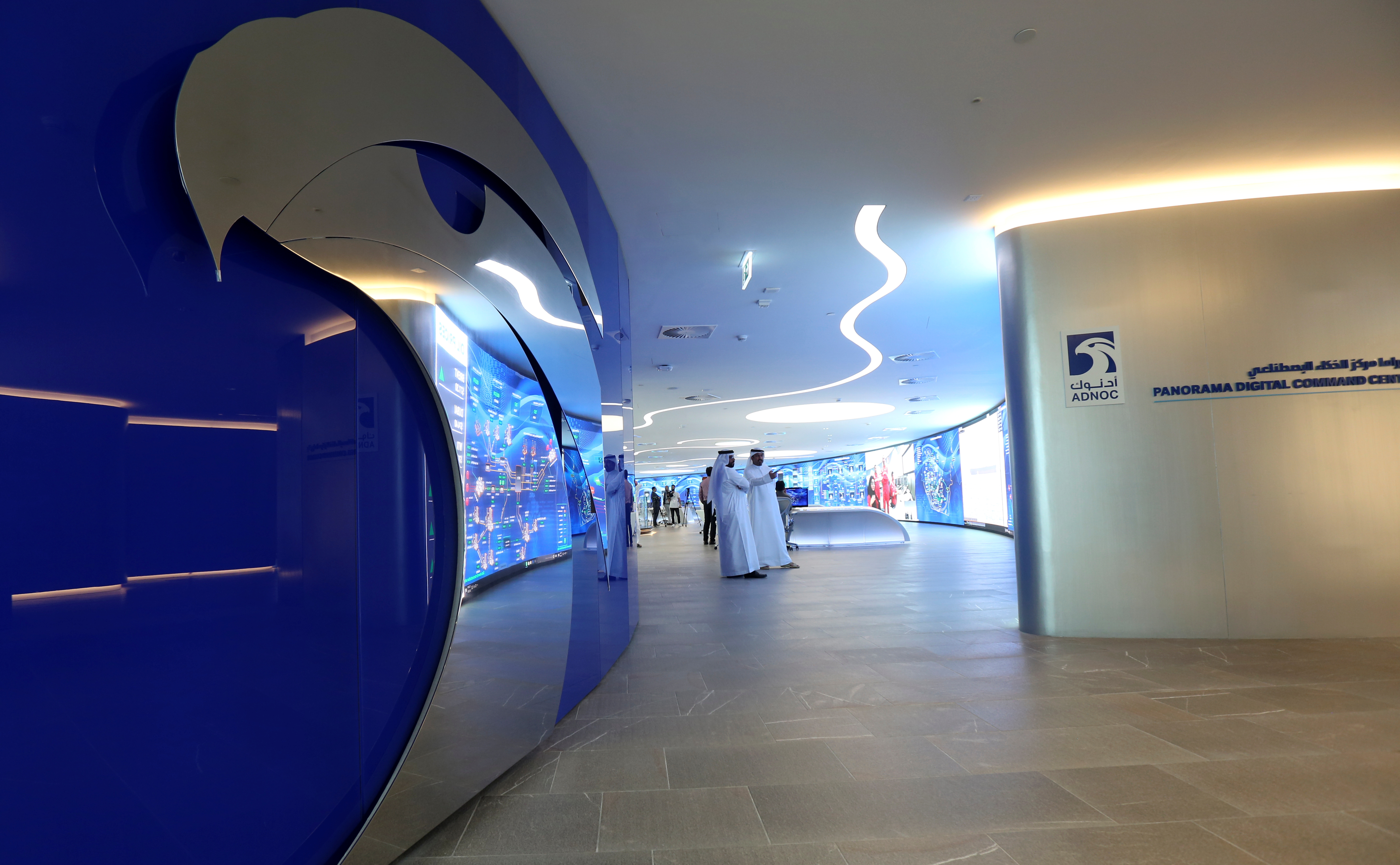 Staff are seen at the Panorama Digital Command Centre at the ADNOC headquarters in Abu Dhabi