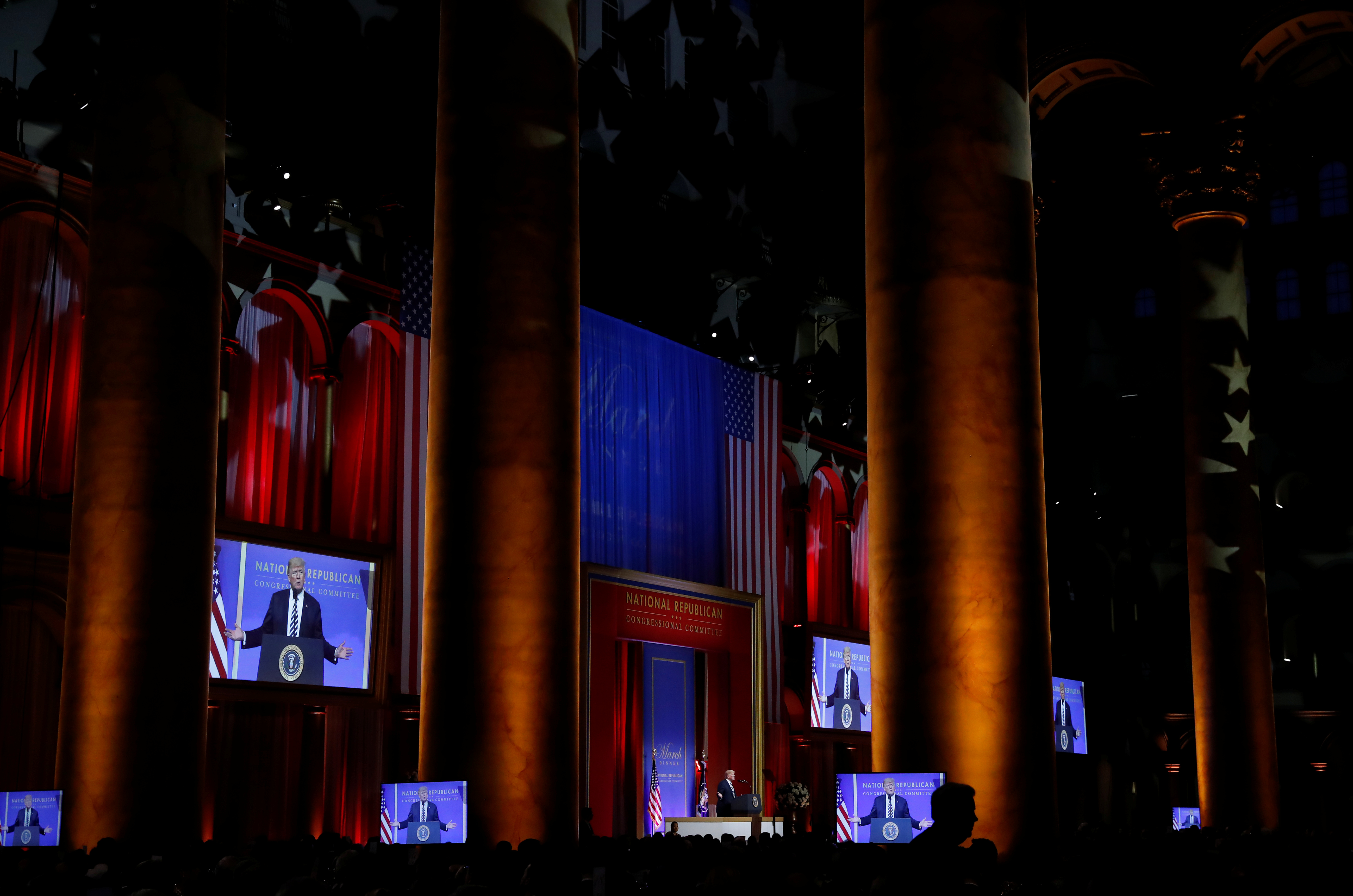 U.S. President Donald Trump delivers remarks at the National Republican Congressional Committee's annual March dinner at the National Building Museum in Washington, U.S., March 20, 2018. REUTERS/Leah Millis