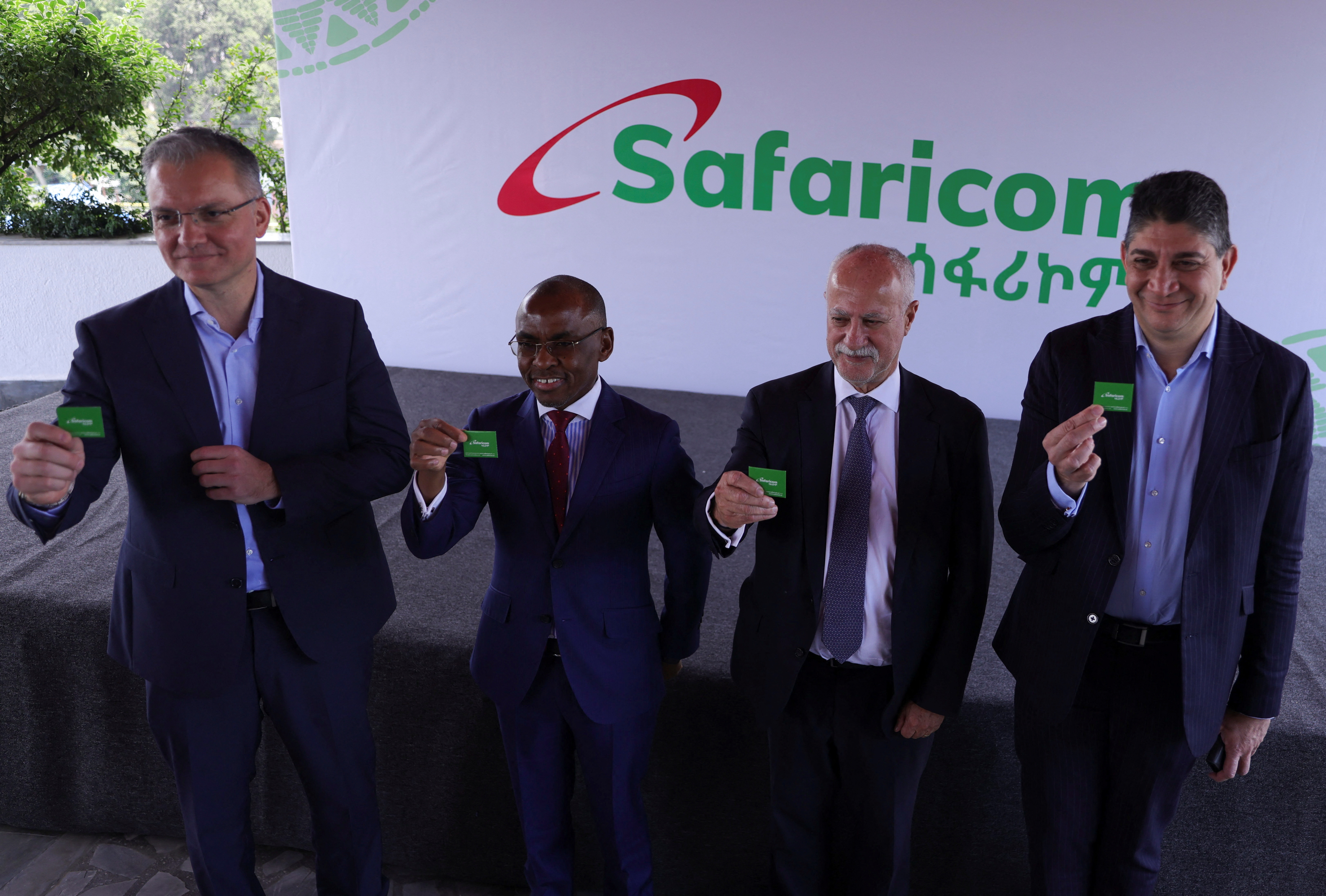 Anwar Soussa, Managing Director of Safaricom Telecommunications Ethiopia PLC, holds Safaricom sim-cards during the Safaricom service launch in Addis Ababa