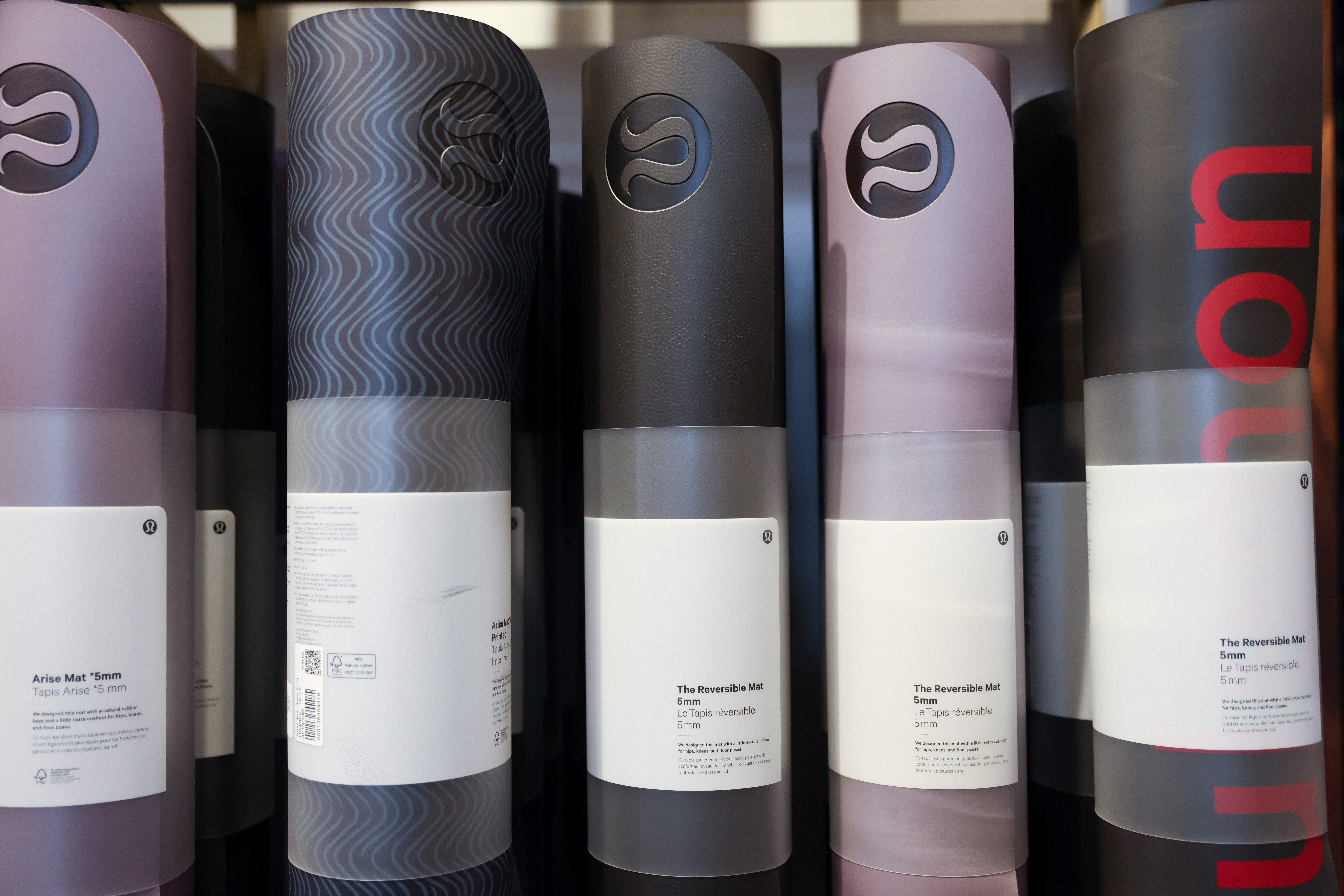 Yoga mats are seen on display in a Lululemon Athletica store in Manhattan, New York
