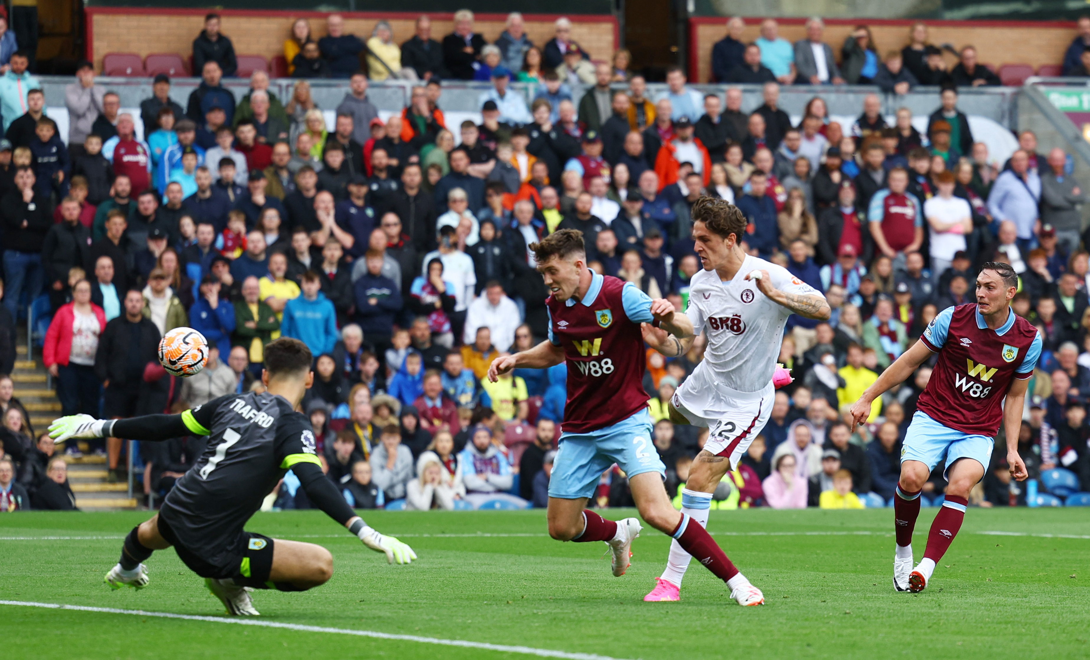 Cash scores 2 in Villa's 3-1 win at Burnley. Brick thrown at