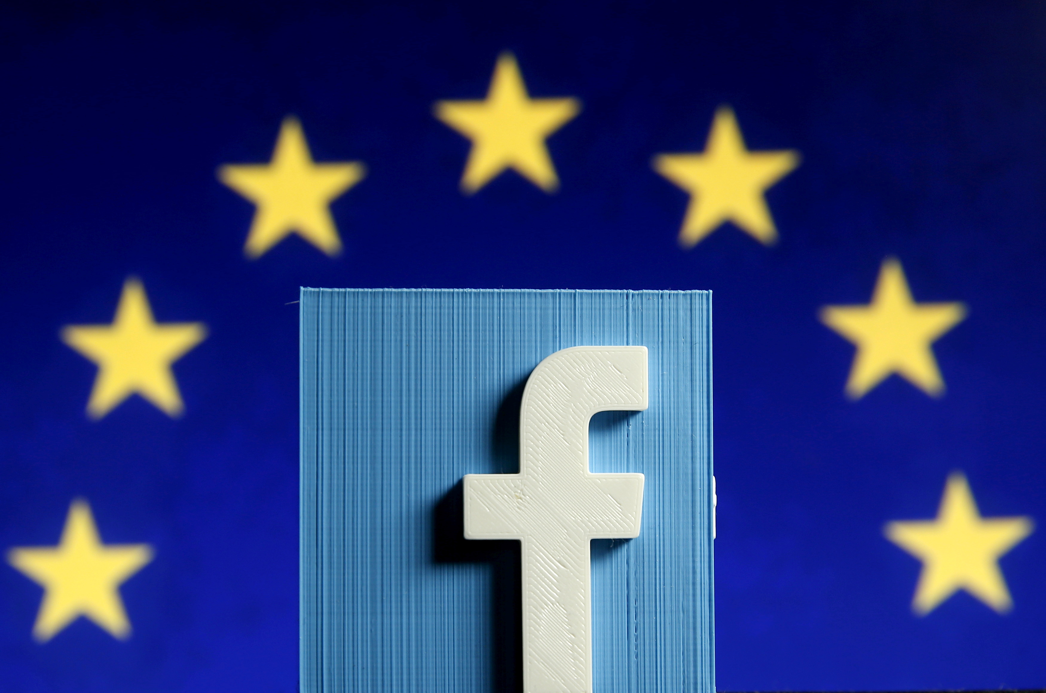 Picture illustration of 3D-printed Facebook logo in front of EU logo