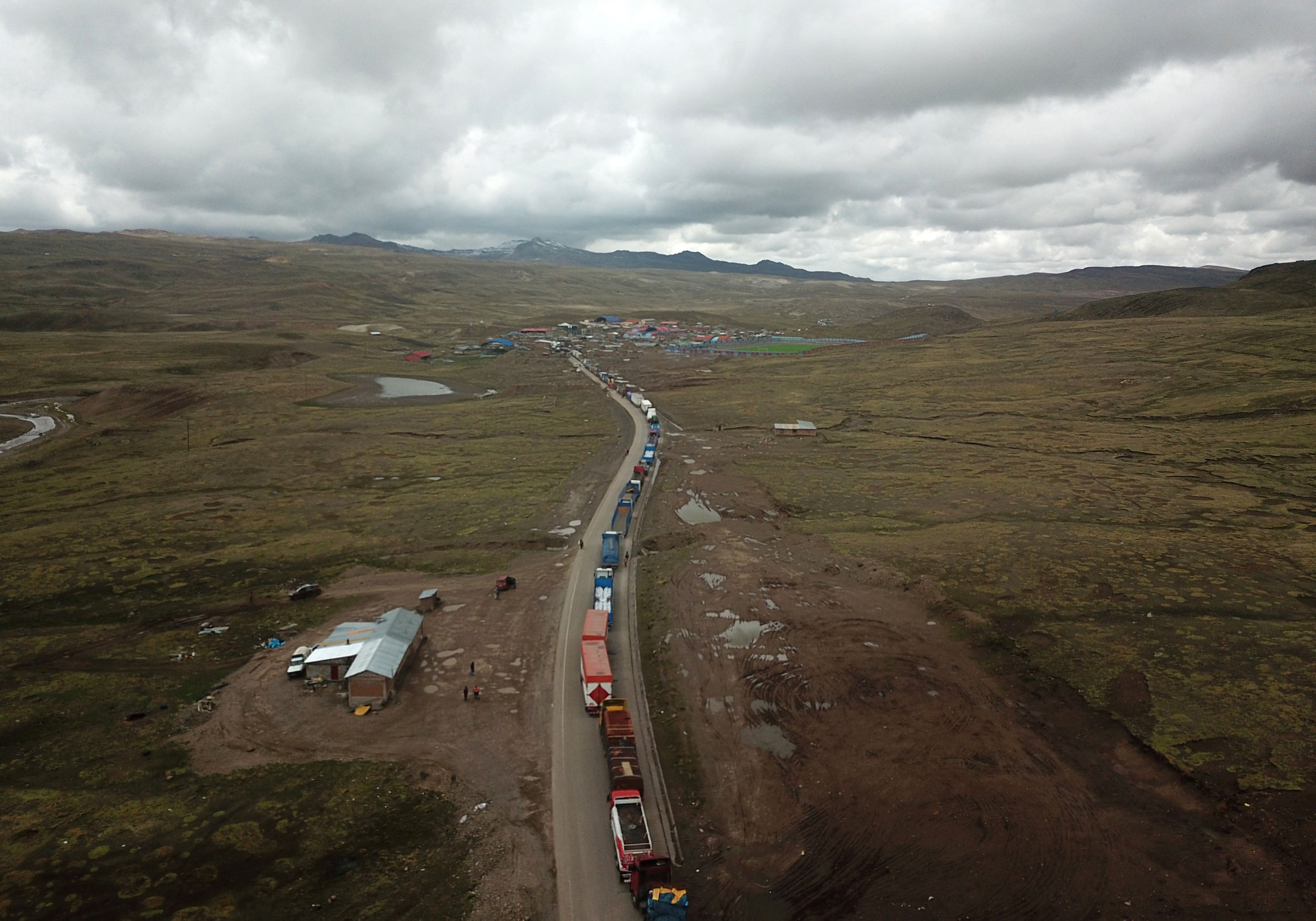 An aerial view of trucks stuck during a roadblock caused due to a demonstration by anti-government protestors, in Condoroma