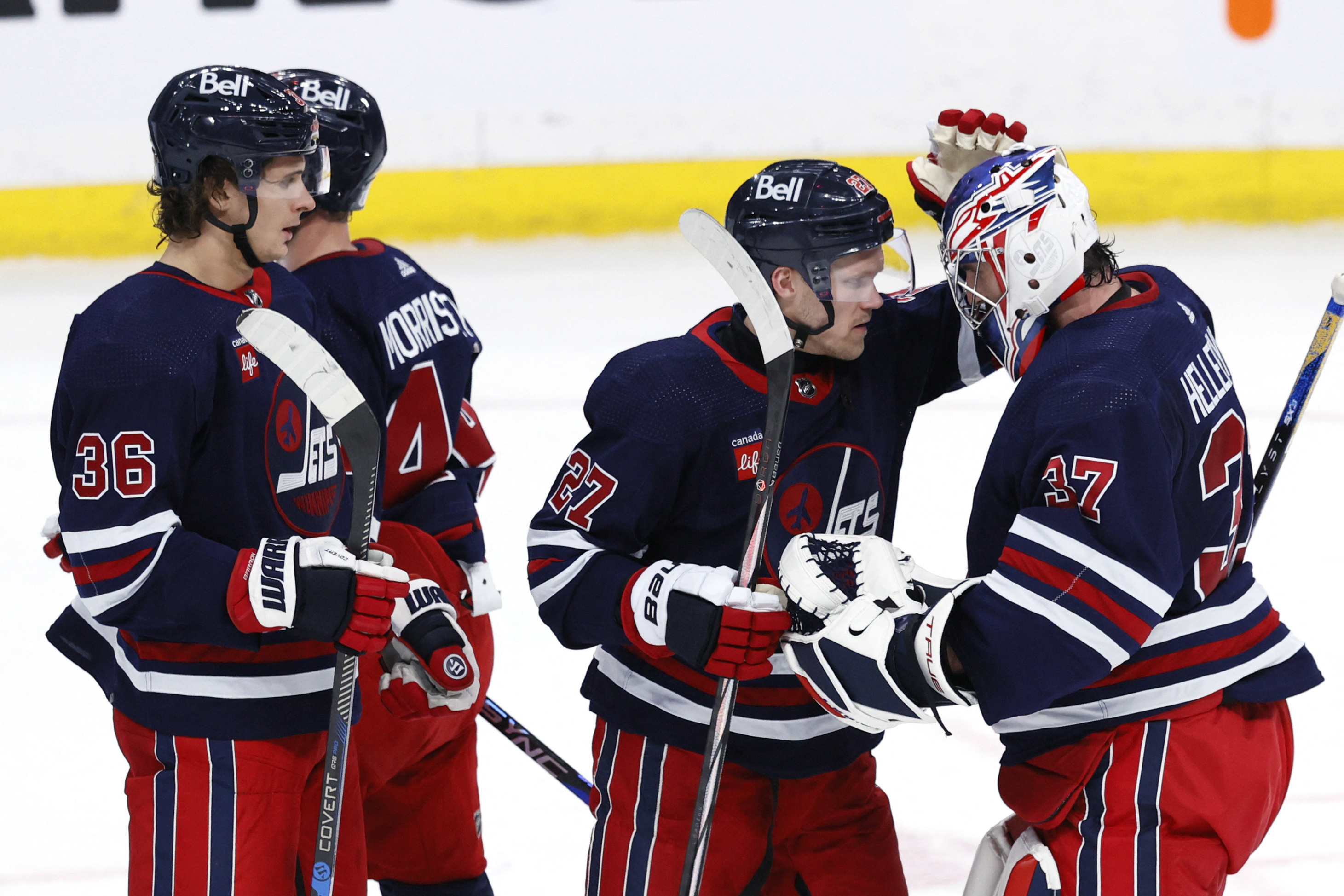 Connor Hellebuyck, Jets Blank Sharks 1-0 | Reuters