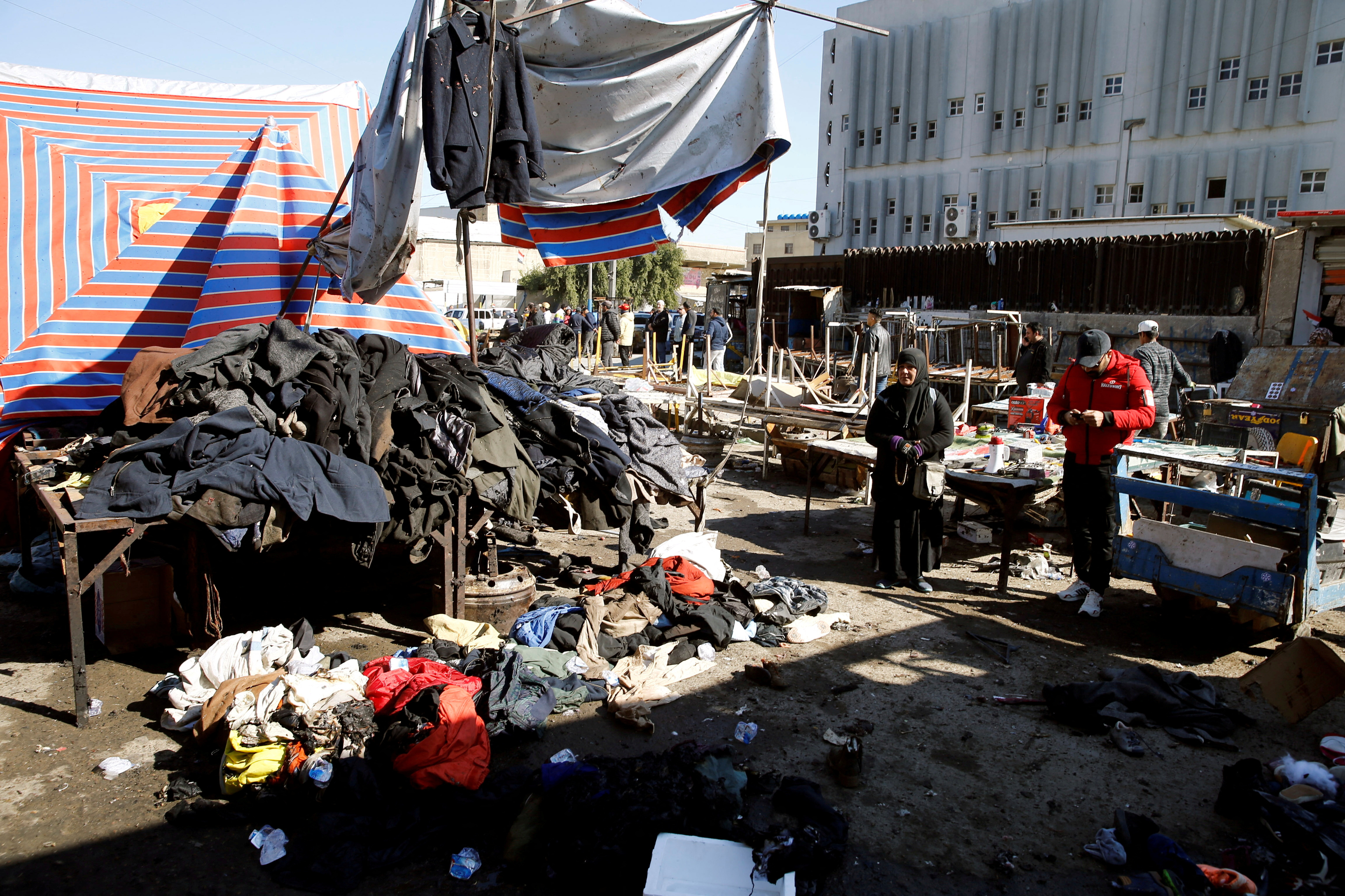 The site of a twin suicide bombing attack in a central market is seen in Baghdad