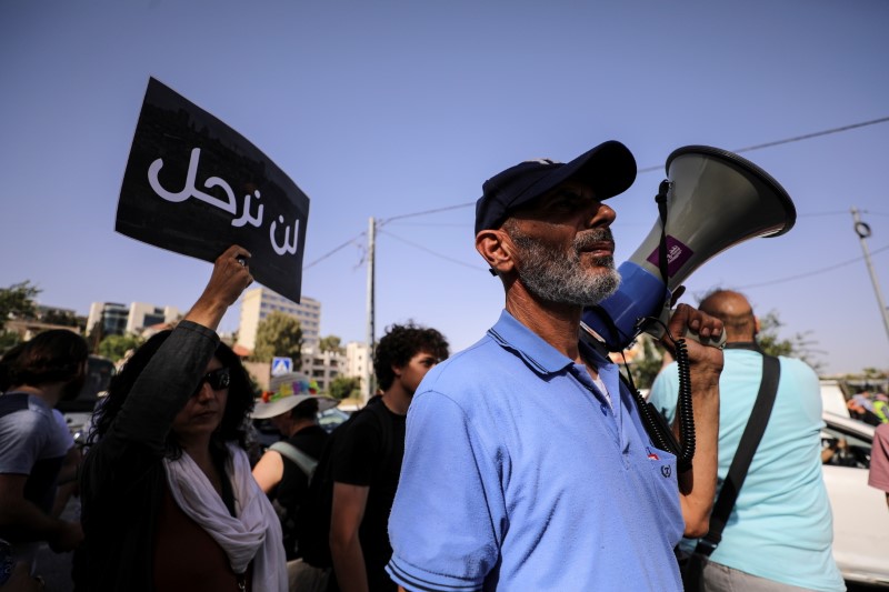Saleh Abu Diab, a Palestinian resident of Sheikh Jarrah, takes part in a protest against his possible eviction after an Israeli court accepted Jewish settler land claims, in his neighbourhood in East Jerusalem