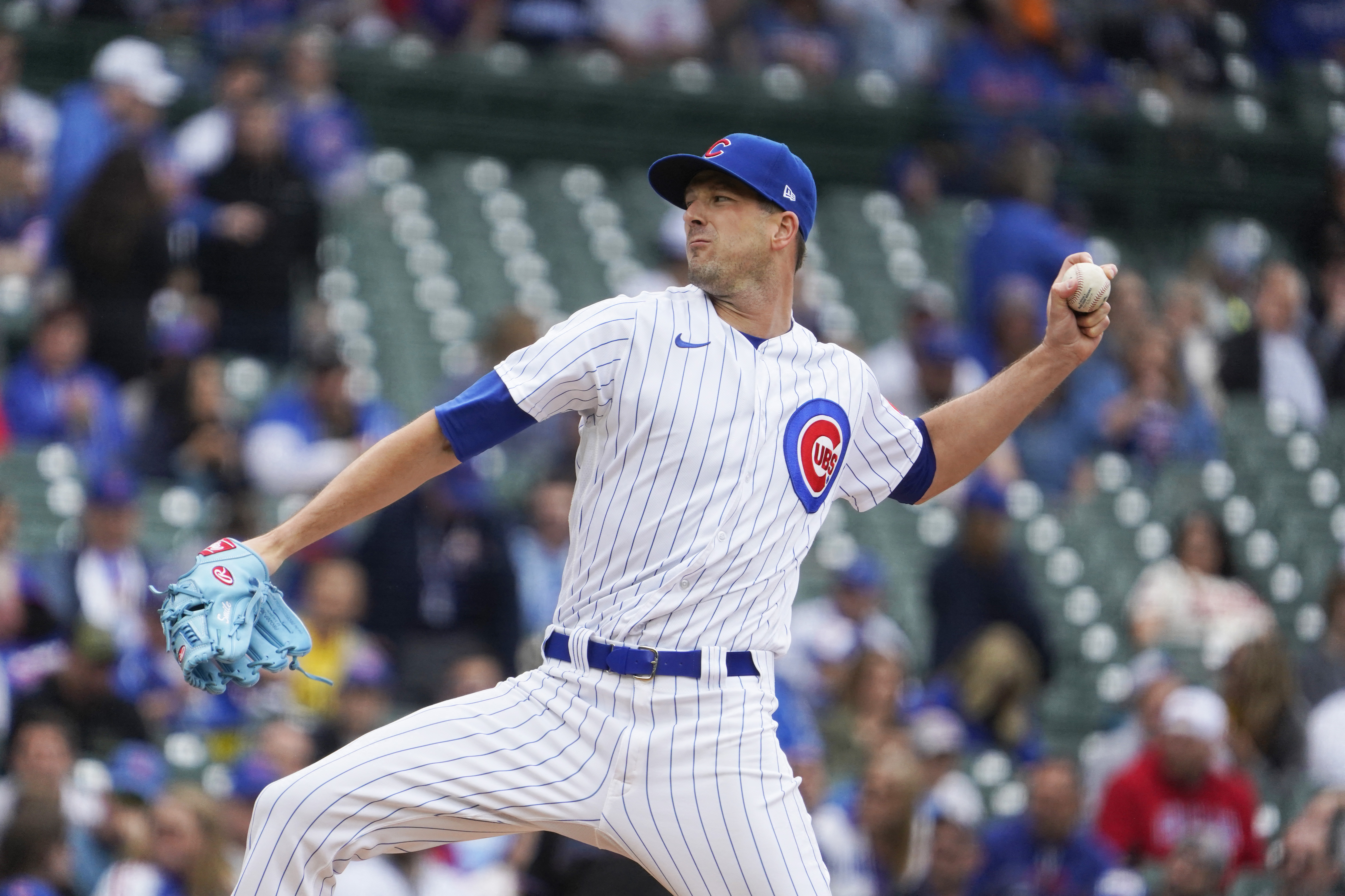 Former Chicago Cubs pitcher Kerry Wood throws out a ceremonial